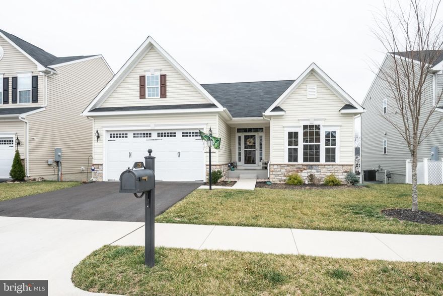 Covid Free!  Pristine rambler with full finished basement and all the upgrades.  Hardwood floors , Master bedroom with master bath on first floor with 2 more bedrooms and bath.  Kitchen is open to living area with cathedral ceilings,  Beautiful cabinents in kitchen with stainless steel appliances and granite countertops.  Basement has a large bedroom bath and huge family room.  Lots of storage space in basement with huge utility and workspace.  Double car garage which is painted.   Yard can be easily fenced with existing fencing on both sides.