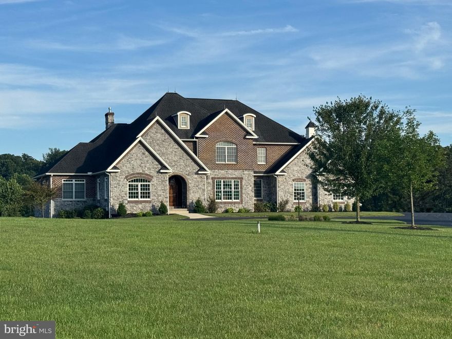 Welcome to this exceptional custom-built residence located on over 5 private acres in the highly sought-after Allen Glen neighborhood. Designed with timeless architecture and refined finishes throughout, this home features over 6,000 square feet of living space, including 4 bedrooms, 4.5  bathrooms, and a finished basement.