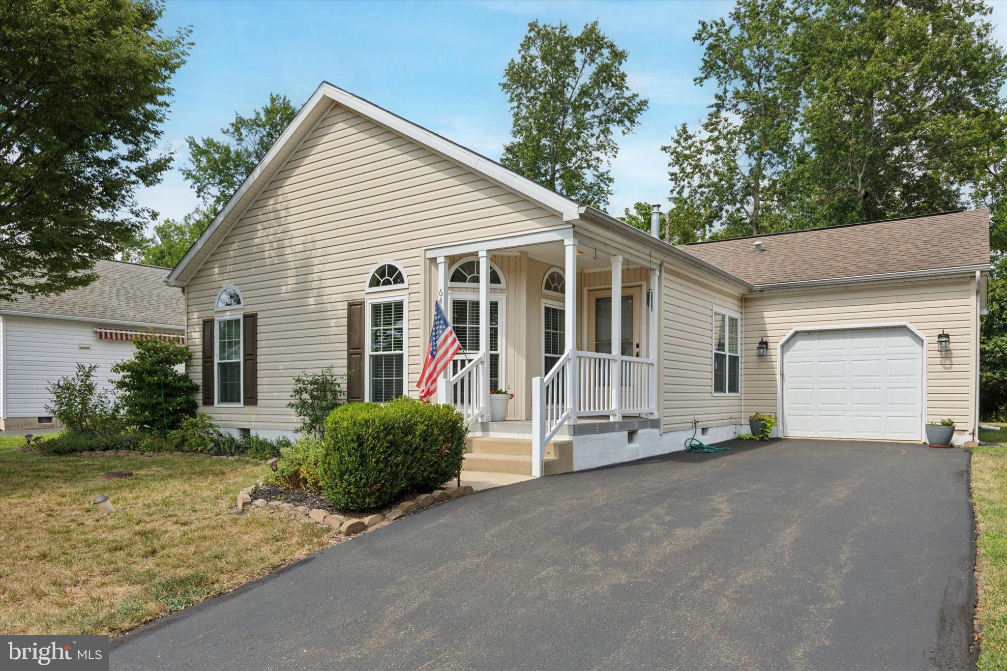 Looking to live in a vibrant active adult community where everything is designed for your comfort and enjoyment. Enjoy the best of both worlds with this lovingly maintained home, offering a peaceful and relaxing atmosphere while being conveniently located near everything you need. Step into the spacious living room with beautiful hardwood floors. It's a great space to relax or entertain. Just beyond, the dining room is bathed in warm sunlight that pours through the floor-to-ceiling windows and flows easily into the beautiful kitchen. You'll love preparing meals in this large kitchen with its convenient center island and abundant counter space for all your culinary needs. Did I mention its charming breakfast nook, perfect for enjoying morning coffee or casual meals? The private den can easily transform into a home office, a cozy library, or even an extra bedroom for overnight guests. The primary bedroom is a comfortable and private space, with a large walk-in closet and a convenient en-suite bathroom featuring double sinks and a separate walk-in shower. The second bedroom is also generously sized with ample closet space and is located across the full hall bath. The laundry room features a washer and dryer, as well as easy access to the garage for loading and unloading. Additionally, this home has a rear patio where you can sit and unwind, grill, dine, etc. Enjoy the ease of living in the heart of Blue Bell, with easy access to shopping, recreational activities, and major highways.