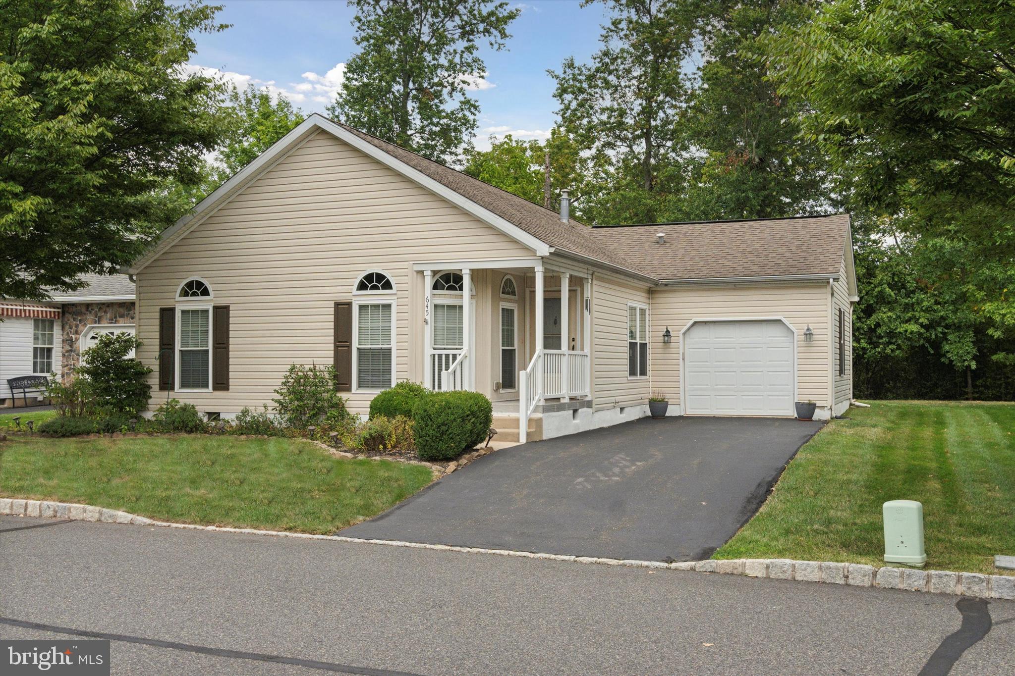 Looking to live in a vibrant active adult community where everything is designed for your comfort and enjoyment. Enjoy the best of both worlds with this lovingly maintained home, offering a peaceful and relaxing atmosphere while being conveniently located near everything you need. Step into the spacious living room with beautiful hardwood floors. It's a great space to relax or entertain. Just beyond, the dining room is bathed in warm sunlight that pours through the floor-to-ceiling windows and flows easily into the beautiful kitchen. You'll love preparing meals in this large kitchen with its convenient center island and abundant counter space for all your culinary needs. Did I mention its charming breakfast nook, perfect for enjoying morning coffee or casual meals? The private den can easily transform into a home office, a cozy library, or even an extra bedroom for overnight guests. The primary bedroom is a comfortable and private space, with a large walk-in closet and a convenient en-suite bathroom featuring double sinks and a separate walk-in shower. The second bedroom is also generously sized with ample closet space and is located across the full hall bath. The laundry room features a washer and dryer, as well as easy access to the garage for loading and unloading. Additionally, this home has a rear patio where you can sit and unwind, grill, dine, etc. Enjoy the ease of living in the heart of Blue Bell, with easy access to shopping, recreational activities, and major highways.