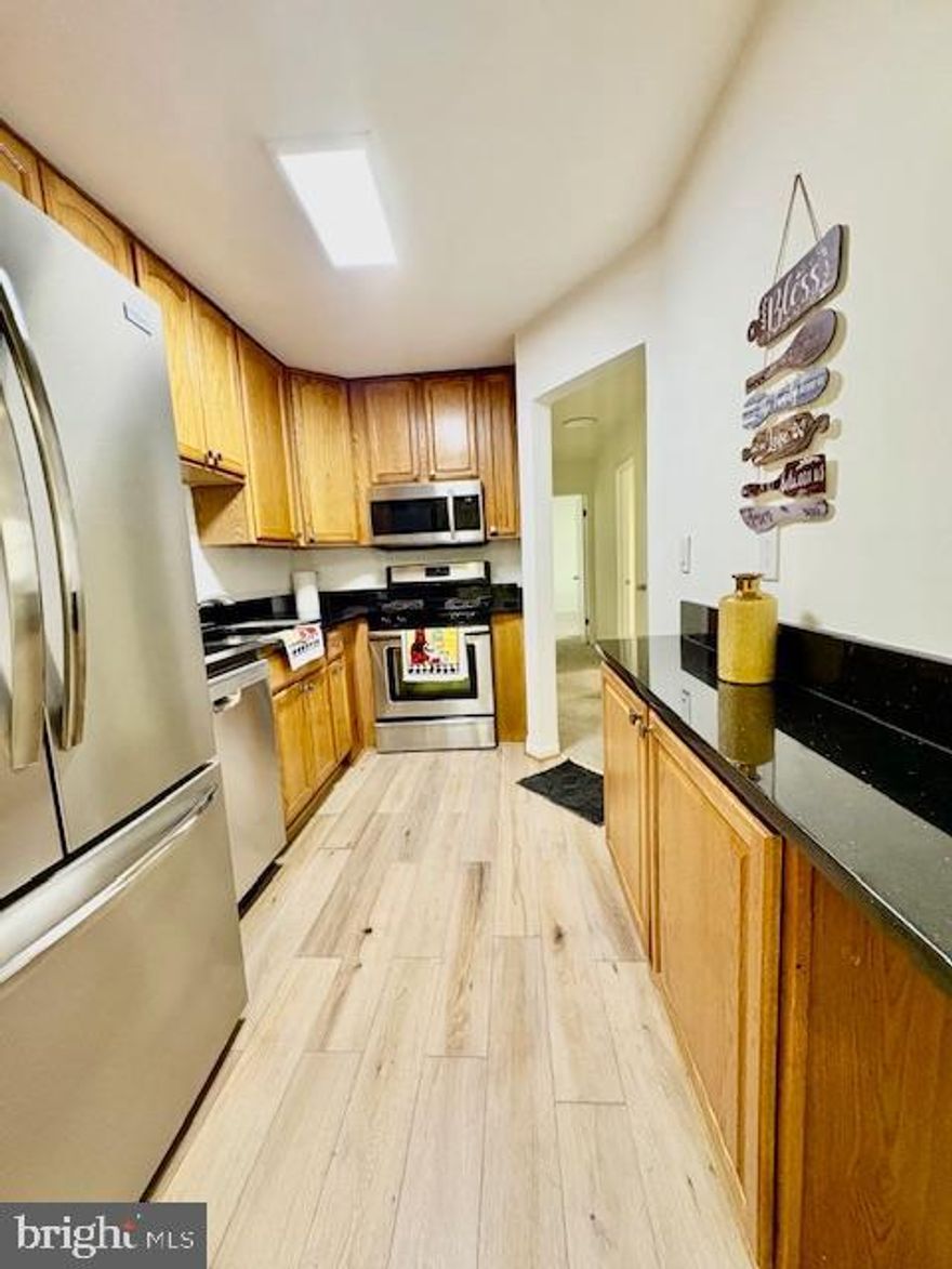 **Fully Renovated and Move-In Ready!** This stunning 3-bedroom, 2-bath residence has been completely updated and offers the perfect blend of modern finishes, space, and convenience in a beautifully maintained garden-style community.

The home features a fully renovated kitchen and bathrooms with stylish, contemporary updates. Brand new carpeting has been installed over beautifully preserved hardwood floors (in compliance with condo requirements), giving the home a fresh, clean feel while maintaining its underlying quality.

The spacious layout offers bright, open living and dining areas, ideal for both everyday living and entertaining. The primary suite features a private en-suite bathroom and generous closet space, while two additional bedrooms provide excellent flexibility for guests, home office, or additional living space.

**Rare bonus: Two assigned parking spaces convey.** Residents enjoy access to a community swimming pool and well-maintained grounds.

Even better, the condo fee includes **all utilities—electric, gas, heat, air conditioning, water, and trash—providing exceptional value and predictable monthly costs.**

Unbeatable location close to Route 1, I-95, College Park Metro, University of Maryland, shopping, dining, and major commuter routes.

**Turn-key, fully updated, and exceptional value—this one will not last long.**