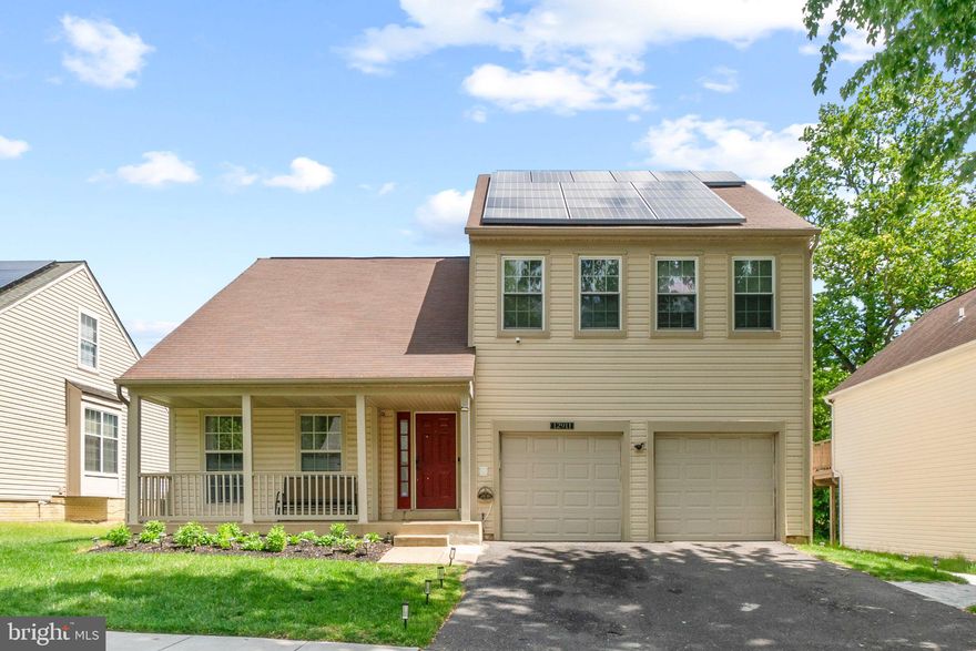 Beautifully updated home featuring quartz countertops and matching backsplash, newer kitchen appliances, and updated cabinetry. The fully livable basement includes a kitchenette and walk-out access, making it ideal for guests, extended living, or entertaining. Enjoy the large deck overlooking a well-manicured yard. The updated primary bathroom, luxury vinyl plank flooring on the main level, and hardwood floors upstairs add warmth and style throughout the home.