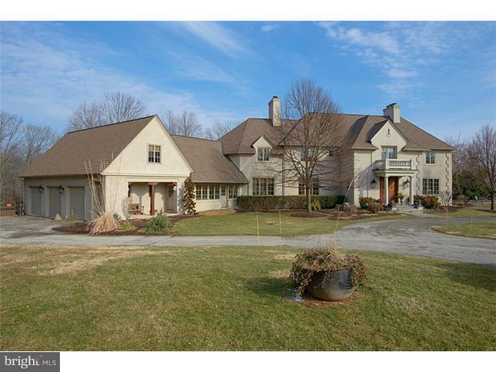 Fantastic custom built all masonry home by Archer and Buchanan. Situated overlooking a spring fed lake and surrounded by fenced pastures. A five stall barn compliments this bucolic setting. Exquisite interior finishes and thoughtful design, combine to create this one of a kind country property. Some special features include: Brazilian Cherry flooring throughout, whole house generator, 10 ft. first floor ceilings, abundant trim and large insulated windows, offering a view of the lake from nearly every room. An additional stone 3 car detached garage adds convenience for storing all the equipment needed to maintain this lovely property.