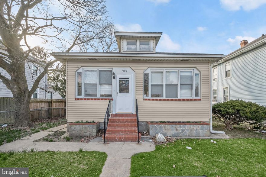 Charm galore from the arched openings to the hardwood floors! Large, bright kitchen and abundant living spaces! Must see. Detatched 2 car garage behind home plus 2 car parking pad.