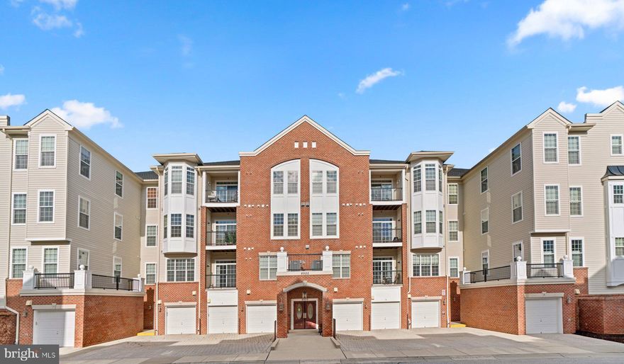 Enjoy a low maintenance lifestyle available now in this 1,890 sqft, 2 bedrooms and 2 bath 3rd floor condominium in The Gatherings at Jefferson Place, a 55+ age-qualified community with a secure entry elevator building and a one car garage. Elegant lobby ushers you to this sunlit home offering a bounty of comforts. Delivering a beautifully maintained space this home features a low maintenance lifestyle, wood louvre shutters, a spacious living room with a tray ceiling and easy to maintain laminate flooring flowing into a dining room adorned with wainscoting and large profile crown molding, and a study. A gourmet kitchen awaits featuring 42" raised panel wood cabinetry, upgraded counters, harmonizing diagonal tile backsplash, stainless steel appliances, and a sunlit breakfast room. Spacious owner's suite presents a deep tray ceiling with a centered ceiling fan, a walk-in closet, an electric fireplace, and private bath displaying a double vanity, a glass enclosed shower, and a platform soaking tub. Community Amenities: club house, party room, gazebo, a grill, common grounds, plenty of activities, and a location across from Long Gate Shopping Center, convenient to golf courses, parks, shopping, dining, commuter routes, and BWI airport.