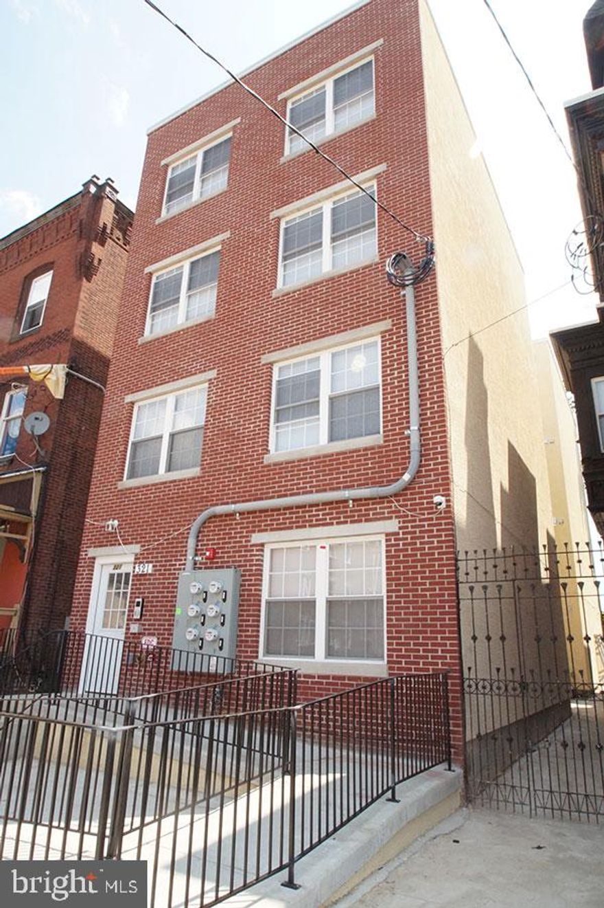 This fully occupied five-unit building commands an annual gross rental income of over  $128,000. Constructed in 2016, it benefits from a tax abatement that will continue through 2026. Each unit is equipped with separate utilities and dedicated HVAC systems, ensuring optimal comfort and efficiency.

The apartments showcase high-quality finishes, including hardwood flooring, granite and stainless-steel kitchens with Shaker cabinetry, dishwashers, built-in microwaves, and tile bathrooms. Each unit includes its own washer and dryer, and all but one apartment is partially furnished. Additionally, a spacious unfinished basement provides ample storage.

The property consists of two 5-bedroom, 2-bath units, one 4-bedroom, 2-bath unit, and two 2-bedroom, 1-bath units.

Located in the thriving West Powelton neighborhood, this property is strategically positioned near the University City Science Center, Drexel University, and the University of Pennsylvania, along with a variety of dining and coffee options. With multiple convenient SEPTA transportation options available, it is less than ten minutes by car or bicycle to Center City—an undeniable opportunity for any investor.
