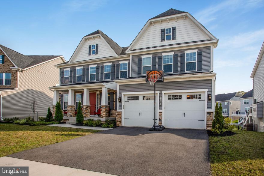 Competitively priced below market. A magnificent opportunity to acquire the sought-after Stratford Hall model in the Maple Lawn South community! Largest homestyle in the subdivision with walkout basement backing to a vast open space. Two-story family room with a coiffered ceiling and fireplace. Each bedroom has a bathroom. Upgrades galore from top to bottom: luxurious bathrooms, designer finishes in kitchen, custom-added windows, upscale blinds, high-end washer/dryer/lighting fixtures and much more! Close to great schools, restaurants and shopping.