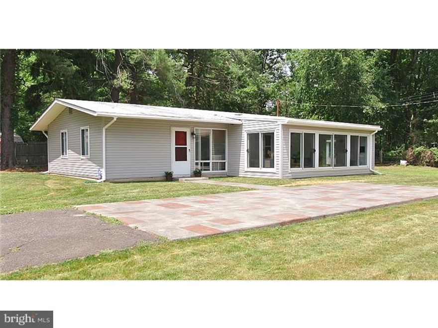 Priced to sell! Charming 3 bedroom ranch, featuring two walls of huge windows in family room/sunroom with ceramic flooring and free-standing propane fireplace.   Many recent upgrades: HW Laminate flooring added to all bedrooms (2013) to match flooring in living room, kitchen and dining area. New Electric Heat pump and central air conditioning system installed (2013), New siding and gutters (2014) and whole home ADT security system installed (2014).  Great storage in wall of upper and lower cabinets in dining area; additional storage in 10' x 20' exterior shed (with electric) PUBLIC SEWER! LOW LOW TAXES! Move-in Condition. Great Value.... single family home close to Doylestown Boro, Close to walking and /biking trails and located in Central Bucks School District.