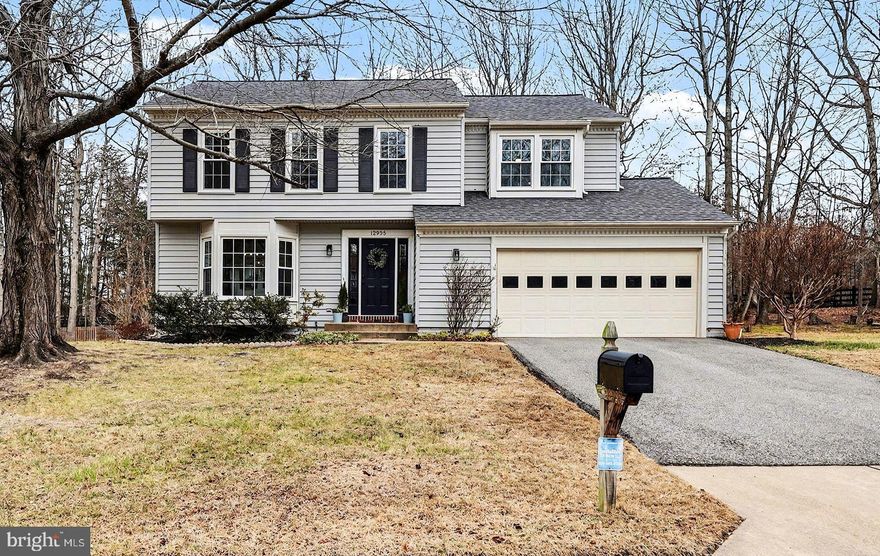 Here's your opportunity to get into highly sought after Old Bridge Estates. Deep into the community on a quiet cul-de-sac street sits this updated colonial beauty that is completely move-in ready. 
Gorgeous home offers 4 bedrooms and 3 and a half baths with a finished walk out basement to a nice lot backing to trees and enough space for entertaining around the fire-pit.  Absolutely stunning Brazilian cherry hardwood floors on main level and stairs, quality carpet on all bedrooms, and durable luxury vinyl flooring in basement.  
Separate formal dining room leads to extra large, fully renovated chef's kitchen open to the family room with a wood burning fireplace.  Main level French doors to a fabulous screened porch and extra deck for barbecuing. The laundry is conveniently located on the bedroom level and the primary suite has ample walk-in closet, en-suite bath with large tiled shower and plenty of natural light.  The windows have all been replaced in recent years as well as the roof, siding, driveway, front door, LL sliding door, and new Google Nest thermostat.  All bathrooms have had significant updates. 
The newer kitchen has extensive storage, quartz counter-tops, two sinks, dual zone wine fridge, added recessed lighting and top of the line KUCHT professional stainless steel 6-burner gas stove, hood and dishwasher. The basement has a rec room with a second full kitchen, a true walk out, and fully renovated bathroom. There is also ample storage in the basement. Garage fits two cars plus built-in shelving, bike rack for additional storage.
Community offers walking trail, pool, clubhouse, tennis courts, playgrounds all nearby. This is a must see home!