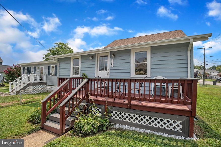 Welcome to your new home at 4101 9th Street in the heart of North Beach, Maryland! This  3-bedroom, 1 and half bath house offers the perfect blend of modern comfort and coastal convenience. Located just a few blocks from the boardwalk and sandy beach, you'll love the easy stroll to waterfront activities, local shops, and a variety of restaurants. Forget the hassle of parking. The home is situated within easy walking distance of the North Beach boardwalk, public beach, and downtown shops and restaurants. Enjoy summer farmers' markets, "First Friday" events, and movies on the beach—all just a short walk away. Step inside to a home that has been fully updated. Enjoy new waterproof laminate wood flooring throughout, a fully remodeled kitchen with stainless steel appliances, and an updated bathroom. The property features a fully fenced yard for privacy and outdoor enjoyment, along with a spacious patio perfect for entertaining guests or relaxing after a day at the beach. A large detached garage provides ample space for beach gear, tools, or toys. Don't miss this rare opportunity to live the North Beach lifestyle in a beautifully updated and perfectly located home.