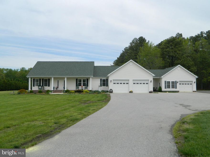 Horse lovers, Mechanics, this ones for you!! Over 10 acres of flat usable land with a great rambler including 4 garage spaces, one garage with oil furnace, and a 16x22 pole barn to make 5th space. 5 acres cleared, 5 acres wooded.  Home has 3 beds 2.5 baths, custom 2x6 construction, front and rear porches, split bedrm plan, master w/ office-den could be nursery. Huge laundry area. Lots more...