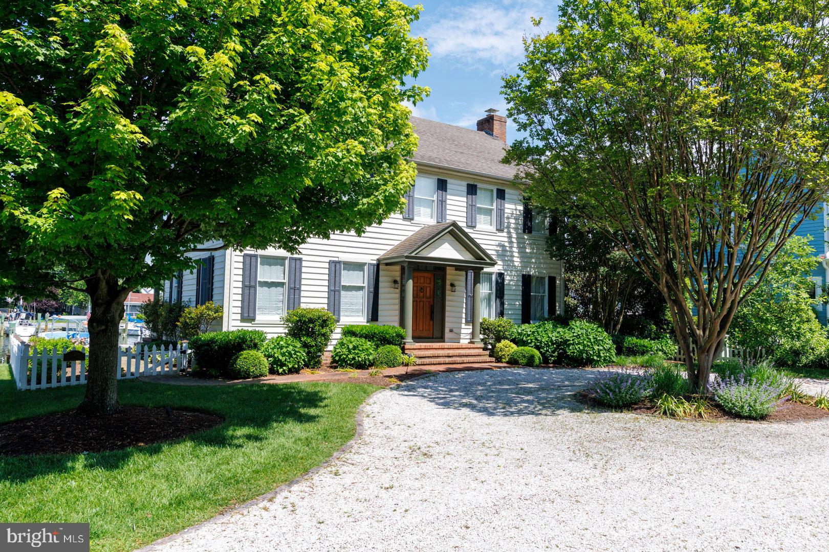 A unique opportunity to own a completely renovated home in the heart of town featuring four deep-water, dedicated boat slips. Located at the end of one of the most coveted, tree-lined streets in St. Michaels, this home is surrounded by beautifully restored historic properties and offers incredible views of St. Michaels Harbor. The current owners have thoughtfully renovated this 3-bedroom, 2.5-bath home inside and out, showcasing coastal décor by a local designer. The home lives comfortably and is designed for both relaxed everyday living and effortless entertaining. Enjoy a covered front porch and balconies off the bedrooms, all with breathtaking views of the harbor. Additional highlights include a fenced-in yard, beautiful professional landscaping, and a rebuilt bulkhead. Ideally located just a short walk to the town’s restaurants, bars, museums, and shops—this home allows you to fully enjoy the charm and lifestyle of historic St. Michaels. Offered completely turnkey .