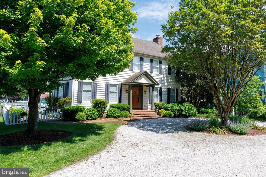 A unique opportunity to own a completely renovated home in the heart of town featuring four deep-water, dedicated boat slips. Located at the end of one of the most coveted, tree-lined streets in St. Michaels, this home is surrounded by beautifully restored historic properties and offers incredible views of St. Michaels Harbor. The current owners have thoughtfully renovated this 3-bedroom, 2.5-bath home inside and out, showcasing coastal décor by a  local designer. The home lives comfortably and is designed for both relaxed everyday living and effortless entertaining. Enjoy a covered front porch and balconies off the bedrooms, all with breathtaking views of the harbor. Additional highlights include a fenced-in yard, beautiful professional landscaping, and a rebuilt bulkhead. Ideally located just a short walk to the town’s restaurants, bars, museums, and shops—this home allows you to fully enjoy the charm and lifestyle of historic St. Michaels. Offered completely turnkey .