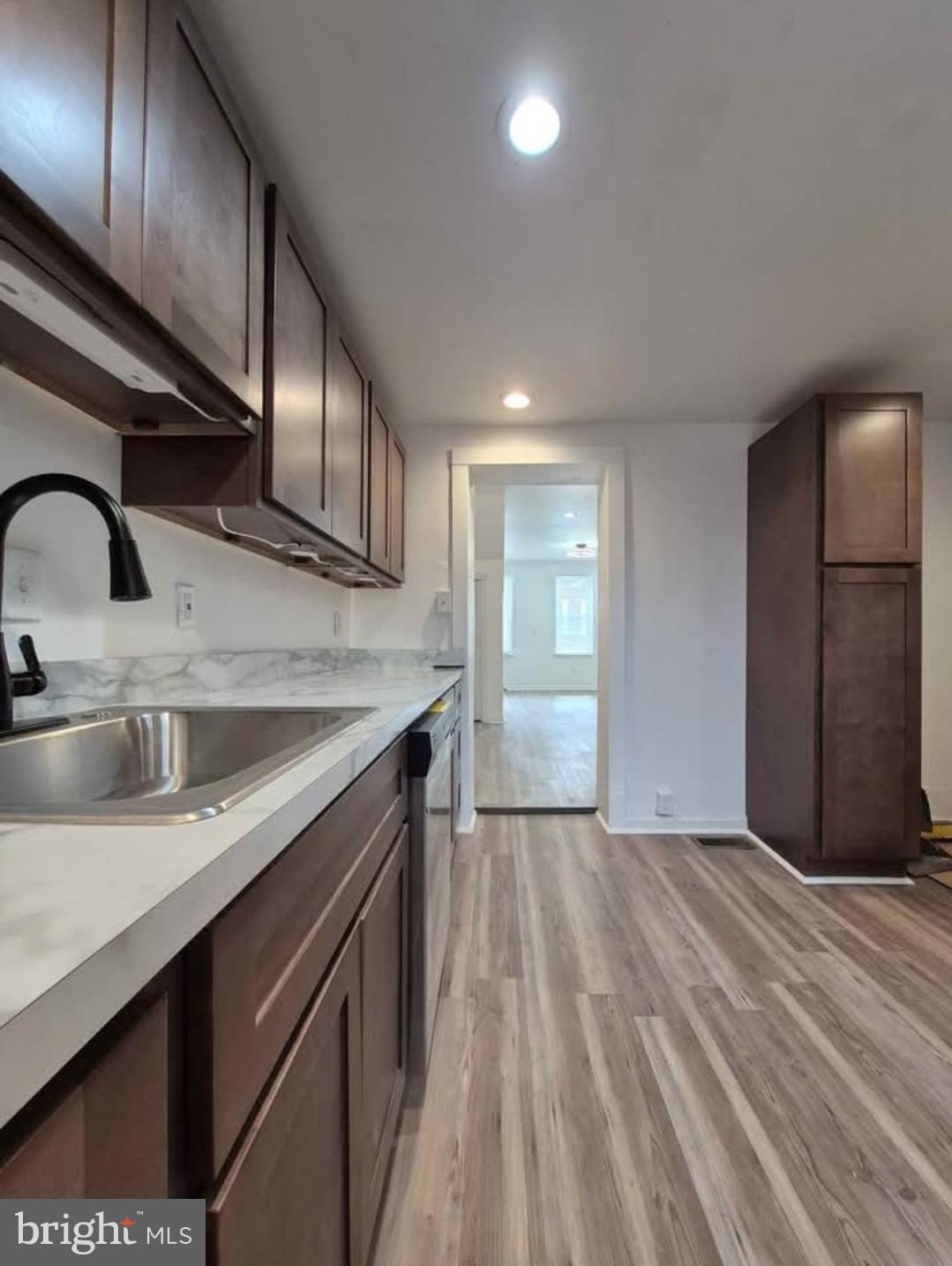 1854 N Judson St is a newly renovated home in the North Philadelphia West. PHA voucher / Section 8 welcomed.
This gem is ready for your move-in, with new floors recessed lighting and contemporary light fixtures. 1st floor powder room and in the kitchen - stainless steel appliances, cherry cabinets, and complementary white countertops. The second floor has three bedrooms and a beautifully renovated full bathroom. The washer and dryer in the basement, and the clean fenced backyard complete this home. *Photos are of a similar house.