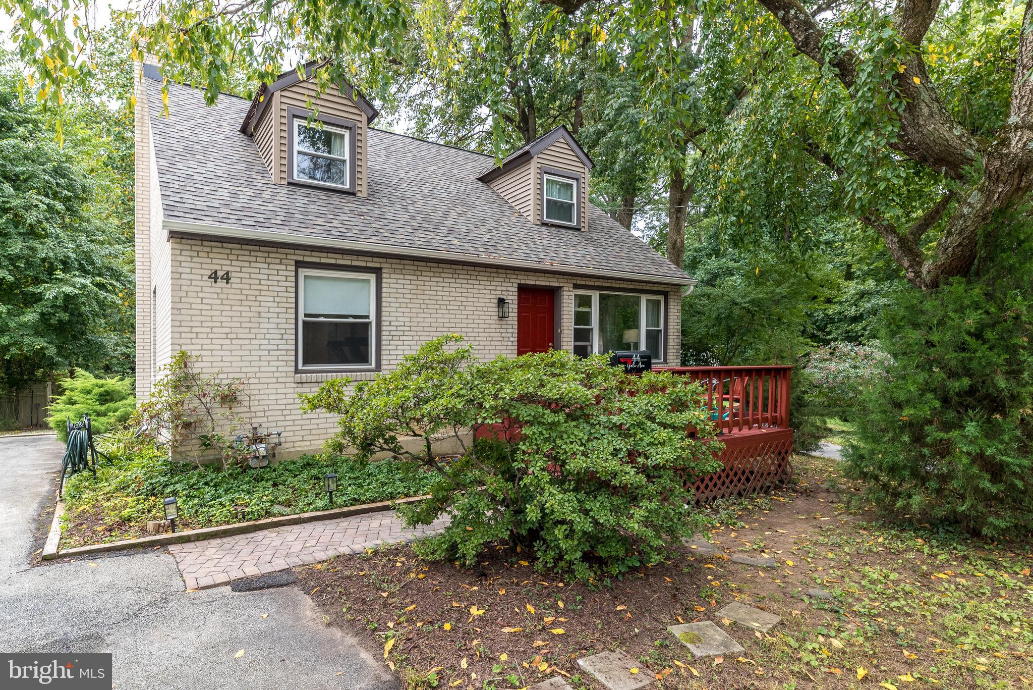 Welcome to this beautifully expanded 4-bedroom, 2-bath Cape Cod in the heart of Swarthmore, Pennsylvania. Nestled in a peaceful, wooded setting, this home blends timeless charm with thoughtful updates and modern amenities.
Step inside to an inviting open floor plan filled with natural light. The living room features a large bay window overlooking a graceful weeping cherry tree, while the spacious kitchen boasts BRAND NEW granite countertops and backsplash, 1 year old stainless-steel appliances, and a newer gas stove with grill—perfect for cooking and entertaining. Just beyond, the family room addition offers a cozy gathering space with serene views of the expansive backyard and creates a daily retreat surrounded by nature.
Two main-level bedrooms provide flexible options for guests, a home office, or a fitness space. The full bathroom on the main level provides convenience and comfort.
Upstairs, the primary suite offers a private balcony deck—ideal for morning coffee or evening relaxation. There is also a large, walk-in closet, with plenty of space for your personal belongings. An additional upstairs bedroom and bathroom add convenience and privacy while overlooking the lush backyard.
With a BRAND NEW ROOF and Gutters, you’ll enjoy year-round peace of mind. The full unfinished waterproofed basement with laundry facilities provides ample storage and endless potential for future living space.
This location offers the best of Swarthmore living—just a short walk to Little Crum Creek Park, Swarthmore College, and the vibrant town center, where boutiques, cafés, and community events create a welcoming small-town feel.
Don’t miss the chance to call this rare and inviting home your own—where character, comfort, and convenience come together in one special property.