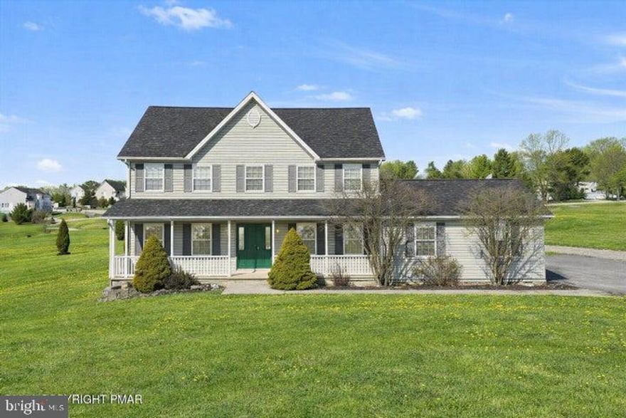 Welcome to your next happy place -- a stunning 4-bedroom, 2.5-bathroom home with over 4,000 square feet of living space and a brand new roof to boot! New Furnace and A/C to save you money.. Step onto the country front porch and soak in those jaw-dropping views of rolling hills and mountains. Seriously, your morning coffee just got a major upgrade. Inside, you'll find gorgeous hardwood floors in the living and dining rooms, a cozy family room with a propane fireplace and soaring ceilings, and a spacious granite kitchen with a generous island perfect for gathering. The second floor features a relaxing primary bedroom with a garden tub made for unwinding. Two additional bedrooms and a full bath keep everyone comfortable. Head up to the finished third floor for a large fourth bedroom plus a bonus den or office space. Oh, and did we mention the fully finished walkout basement? Heated and loaded with storage, it's the cherry on top. Nestled in a peaceful Pocono Mountains neighborhood surrounded by natural beauty, this home delivers the perfect blend of space, comfort, and scenery.