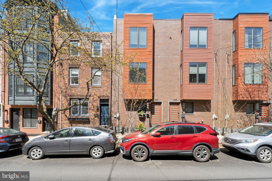 Welcome to 1637 Fitzwater Street—a serene oasis nestled in the heart of the vibrant Graduate Hospital neighborhood! This stunning home offers four floors of thoughtfully designed living space, complete with three bedrooms, three and a half bathrooms, gated garage parking, a rooftop deck, and a private back patio. It’s the perfect blend of comfort, convenience, and modern city living, catering to a variety of lifestyles.

Step through the front door into a sunlit hallway that sets a welcoming tone. As you pass the oversized staircase and coat closet, you'll arrive at the first-floor bedroom with its own ensuite bathroom—an ideal retreat for guests or a private home office. Continue through to the rear of the home, where you’ll find access to your gated parking spot within a shared garage. The garage includes additional storage space for bikes, outdoor gear, and more. Back inside, head down to the lower level, which opens to a versatile second living area. Whether you envision it as a playroom, exercise space, or media room, the high ceilings make it feel airy and inviting. A large utility closet on this level provides ample storage for household essentials.

On the second floor, the home truly shines as a space for entertaining and everyday living. The dedicated dining room flows seamlessly into a spacious kitchen outfitted with stainless steel appliances, granite countertops, and a central island with seating. Just beyond, the expansive living room features a cozy gas fireplace, while sliding doors lead to a Trex deck—perfect for morning coffee, al fresco dining, or unwinding with a book.

The third floor is your personal sanctuary. The primary suite boasts a charming Juliet balcony, ceiling fan, and sweeping city views. The luxurious ensuite bathroom features a double vanity, a spa-like glass-enclosed shower, and a jacuzzi tub for ultimate relaxation. Down the hall, you’ll find the convenience of a laundry cove and the third bedroom, which also includes its own ensuite bathroom.

Finally, ascend to the rooftop deck, where you’ll be greeted by breathtaking, unobstructed views of the Philadelphia skyline. Whether you’re hosting friends or enjoying a quiet evening under the stars, this space is the crown jewel of the home.

Located in the heart of Graduate Hospital, this home offers unparalleled access to the best of city living. Stroll to the Marian Anderson Recreation Center, Christian Street YMCA, and the lively South Street corridor, filled with bars, restaurants, and shopping. Plus, you’re just a short walk from Rittenhouse Square, South Philly’s neighborhoods, and the amenities along Broad Street and Washington Avenue.

Come experience the perfect mix of space, style, and location at 1637 Fitzwater Street. Don’t miss your chance to call this exceptional property home!