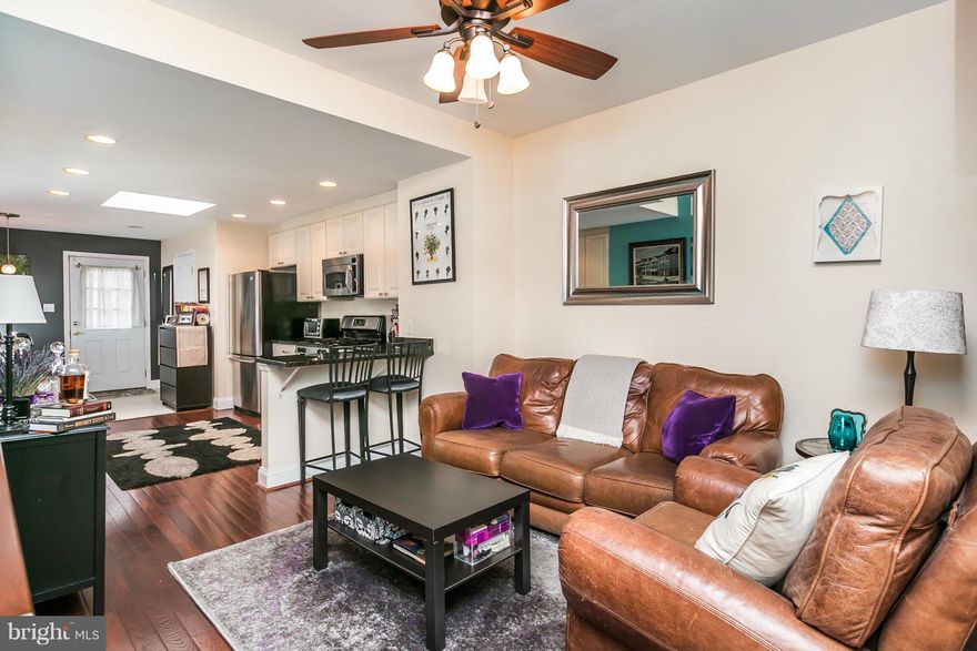 Outstanding 3 bedroom Federal Hill townhome w/ patio & beautifully landscaped rear yard, wood floors, exp brick. 1st floor has separate living & dining rooms, kitchen w/breakfast bar, granite, stainless, tons of counter & cabinet space, table space & half bath. 2nd floor has light-filled bedroom & large full bath. 3rd floor has 2 spacious bedrooms. Unfinished lower has plenty of storage space.