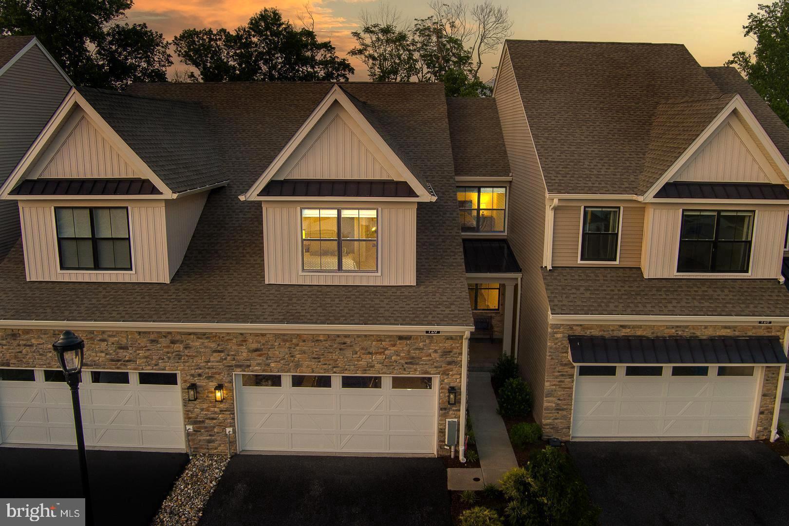 LIKE NEW! Welcome home to 726 Switchman Rd in the desirable community of Franklin Station! This Carriage Collection beauty, privately nestled on a premium lot with untouchable green views, has been rarely lived in and is impeccably pristine from top to bottom. From a private covered front porch entry, you'll find a perfect open floor plan of living space starting at the large foyer. This main level offers a seamless flow for daily living or entertaining with an upgraded expansion of the great room and kitchen with access to the rear deck and to the well appointed dining room. The upgrades continue throughout the interior into the gourmet kitchen with gorgeous quartz countertops, custom Century cabinetry, beautiful tiled backsplash, stainless appliances, gas cooking, ample counter space and center island, recessed and pendant lighting, a large pantry, and with seating at both the island and breakfast room. Enjoy additional dining space during three seasons on the trex deck in a gorgeous unobstructed green natural setting. There is a half bath, laundry room, coat closet, and inside access to the 2 car garage on this main level, with striking upgraded hardwood flooring throughout. Upstairs, find a very spacious primary bedroom that exudes both luxury and comfort options, including a generous spa-like bathroom with impeccable details, and a good size primary walk-in closet..with incredible lush green views from here too. .There are two additional spacious bedrooms and a beautiful hall bathroom, with plenty of closets and storage space on this level. Plush upgraded carpeting an added touch of elegance to the 2nd floor. From the foyer, step down to a huge unfinished super clean basement offering 9+ ft ceilings, great finishing potential, storage, and is plumbed for a bathroom/wet bar or other possibilities! The location of this home in the community is unmatched with the amazing green views and its close proximity to the outdoor pool, fitness and community center! Also very convenient to incredible area shopping & restaurant options, walking and biking trails, WaWa train station, Philly airport, Media Boro abundance of everything minutes away, Linvilla Orchards, theater and local events, major roads, and so much more! Rose Tree/Media's award winning schools! This townhome is truly "LIKE NEW" for a turn key move-in day! Furniture is negotiable. List of upgrades available. Square footage of 2200 from builder details with seller upgraded add on to 1st floor. Come see for yourself!