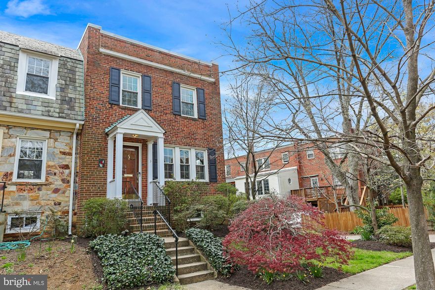 Brimming with charm and character this all brick, end townhome is flooded by light and whimsy.  Landscaped and magnificently maintained, a brick stoop and stairway lead up to the most beautiful, rich oak front door outfitted with Baldwin hardware & mail slot.  This 2 bedroom, 2 bath home is as perfectly located as it is charming. Rosemont is tucked in close to Whole Foods, scores of eateries (including Grape and Bean & Lena’s Pizza) and JUST blocks from both the Braddock and King Street metros, Old Town & Del Ray. Private driveway off the alley that runs behind the homes make parking a breeze.  Entering into the cozy living room with loads of windows, a formal dining room connects the updated kitchen with a breakfast bar. Beautifully neutral Silestone countertops, with a hint of sparkle, and raised panel cabinetry with built-in drawers and organizers. New stainless steel Whirlpool appliances and recessed lighting complete this sleek design. The incredible addition off the kitchen, with bay window, adds the glorious sunroom with exposed brick wall. Pass-through built-in shelves allow for light and flow which extends through the sliding glass doors to the screened in porch - the crown of this jewel! Vaulted ceiling with beams and designer fan, fully screened with 3 sided views make this an amazing retreat from the world. Trex decking makes this low maintenance too!
Hardwood floors throughout the main and upper levels and new light fixtures and ceiling fans. Updated full bath and two spacious bedrooms complete the top floor. 
Lower level features a great rec room, built-in wet bar, expansive storage closet and a 2nd full bathroom. Huge laundry room with cabinetry, countertop and laundry sink. Additional pantry shelving/storage and side door to the back garden. Partially fenced and lush, green lawn with a giant Tulip Magnolia tree fills the garden with songbirds and butterflies. Blocks off the Alexandria waterfront, bike and jogging trails, Minutes to Old Town, Del Ray and DC; I-395, GW Parkway, Rt 1, I-495 and National Airport. Naomi L. Brooks (Maury) Elementary. Don't miss this opportunity for an end TH with private driveway & addition! Beautifully maintained and Just waiting for you to put your shine on it!