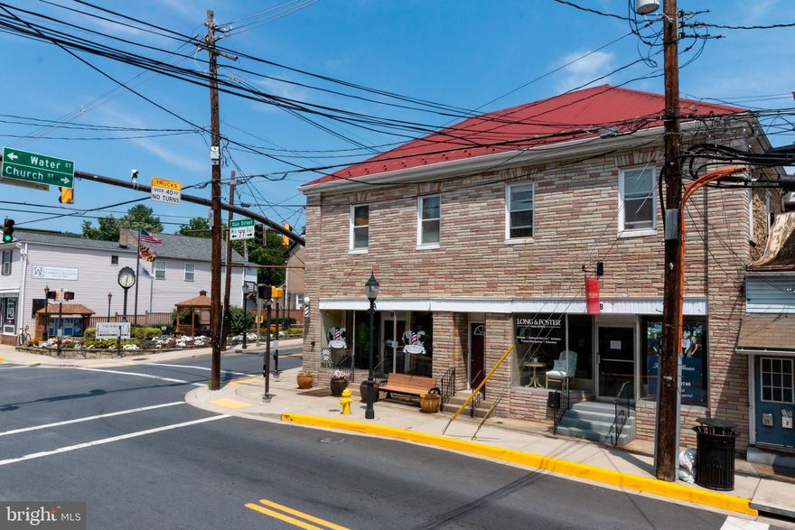 This is your chance to own a part of Historic Thurmont MD, "Gateway to the Mountains!" Located on the corner of Main Street and N Church Street in beautiful Historic Thurmont MD.  This property, (2 North Church St.) is one of three properties being sold together as a package at the listed price of $879,000. To cross-reference other properties included in this packaged price reference the following MLS #'s; (2 North Church St. - MDFR2003072, 8 N. Church St. MDFR2002696 and 5 East Main St. MDFR2002604). "2 North Church Street" is one of the two building offered in the package and includes 8 units; 4 Residential - 2 Bedroom Units & 4 Street Front Commercial Units.  "5 East Main Street" is the second building in the package and has 5 units; 3 Residential - 1 Bedroom Units & 2 Street Front Commercial Units. Commercial and Residential units are Tennant Occupied. All Commercial units are Street-Front. "8 N Church Street" is the third part of the package and is a fully paved 28-30 space parking lot that gives direct access to all apartments and businesses. Plenty of parking for tenants and patrons of businesses. Must see this Turn-Key set of Properties. Again, this listing consists of three separately parceled lots (2 N Church St, 5 E Main, and 8 N Church) sold together for the one package price of $879,000.