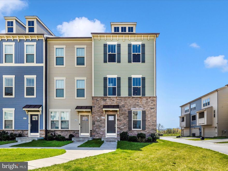 Welcome to 8651 Shady Pines Drive—a beautiful end-unit townhome  with high end specs, right in the heart of Urbana.  Offering 5 bedrooms, 4.5 baths, and panoramic views of Sugarloaf Mountain! This spacious and sun-filled home features an open floor plan with beautiful floors, a gourmet kitchen with double ovens,  granite countertops, a cozy fireplace, and an expansive balcony perfect for entertaining. The top-level loft includes its own bedroom, full bath, and a private rooftop terrace—an ideal retreat with breathtaking views.

The home is thoughtfully designed for privacy and functionality, with a first-floor bedroom and full bath—perfect for guests or multi-generational living. The luxurious primary suite offers a large walk-in closet and a beautifully appointed en-suite bath.

As part of a vibrant and amenity-rich community, residents enjoy access to multiple outdoor pools, a clubhouse, fitness center, tennis and basketball courts, baseball fields, a library, community center, jogging/walking paths, playgrounds, and tot lots. Lawn maintenance, snow removal, trash service, and community management are all included—offering low-maintenance living with a high-quality lifestyle.

Conveniently located near top-rated schools, shopping, dining, and with easy access to both Frederick and Montgomery County—this is Urbana living at its best! Hurry now and schedule an appointment as this will not last long!