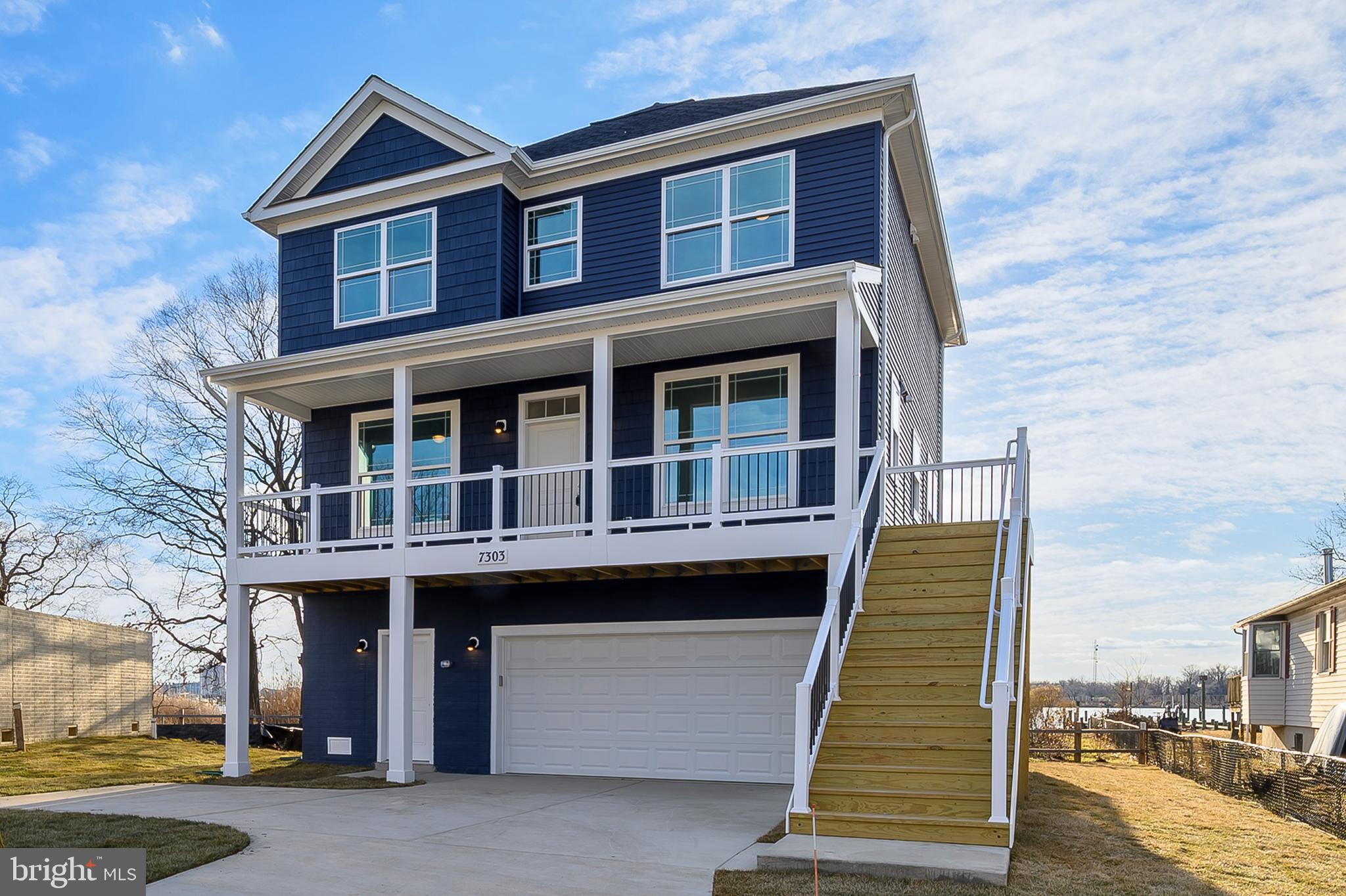 GREAT NEW PRICE!! Experience waterfront living in this brand-new, three-level home in Chesapeake Terrace, built by Main Street Builders in Sparrows Point. Perfectly positioned at the end of the road with stunning views of the Jones River, this thoughtfully designed home features four bedrooms, fourth bedroom can be used as main level study. Also including a spacious primary suite with a private ensuite bathroom, and 2.5 bathrooms in total. Every room is filled with natural light and showcases gorgeous views, creating a bright and airy atmosphere throughout. The open-concept kitchen, boasting sleek white cabinetry and elegant white quartz countertops, flows seamlessly into the dining and living areas. Step out onto the back deck to take in the breathtaking river views, entertain guests, or enjoy a peaceful dinner with family. Plus, with its own brand-new private dock, you’ll have direct water access for boating, fishing, or simply relaxing by the river. Ready for boat lift to be added. 3 ft. at the end of the dock.
Construction techniques include stick built dimensional framing, 2x6 exterior walls and full basement with poured concrete foundation. Upgraded 20 mil Luxury Vinyl Plank flooring throughout the home, designer light fixtures , large kitchen island with quartz countertops, stainless steel appliances and shaker style white wood cabinetry. Recessed lighting throughout. 9 ft. ceilings on main level.
Once home to the iconic Bethlehem Steel plant, Sparrows Point now thrives with major distribution centers like Under Armour, Amazon, Home Depot, Volkswagen and McCormick & Company. Don’t miss the chance to be part of this growing waterfront community!