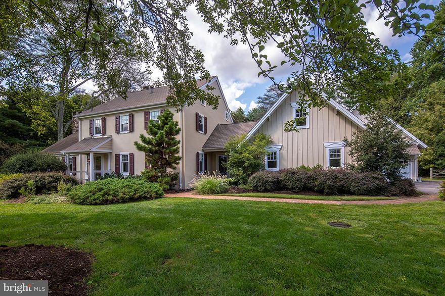 Elegant, rustic features make 1295 Argyle Road the perfect escape from the bustling city. This unique 4 bedroom 3.5 bath colonial farmhouse boasts the convenience and flow of an open floor plan with the comfort and privacy of discrete living spaces. The home welcomes you through a lovely foyer and formal dining room at right and to the left you are captivated by the living room with its vaulted ceilings, custom built-ins and fireplace. The kitchens unique brick floors, wood beamed ceilings and stone alcove give it a rustic farmhouse look and feel. However, with stainless-steel appliances, Subzero fridge, and Bosch dishwasher, this state-of-the-art kitchen is equipped with all the modern amenities. The large island and access to the family room and backyard patio make this kitchen the perfect place for you and your family to come together. The kitchen flows into the family room, with cozy gas fireplace, and then into a multipurpose room with large bathroom, walk-in closet and washer/dryer. This space can act as a comfortable first floor bedroom, an office, or a playroom for the kids. Through the sliding glass doors, you can access the flagstone patio and lush, flat backyard – ideal for hosting a barbecue, playing sports with the family or running around with the dogs. Also, off the kitchen is a convenient mudroom with matching brick floors with a second washer and dryer. The mudroom has access to an attached two car garage and thruway to another attached two car garage, making room for four cars total. From here, a few steps lead up to a large, private room that can be used as anything from a quiet office to an exercise room. 
On the second floor you will find a spacious primary bedroom, with walk-in closet and a full bath. There is also the comfort of 2 additional bedrooms and full hall bath. 
The lower level is currently partially finished and adds more space and versatility to the home. 
All this in the open and welcoming neighborhood of Canterbury Woods and near top-rated Treddyfrin-Easttown schools!