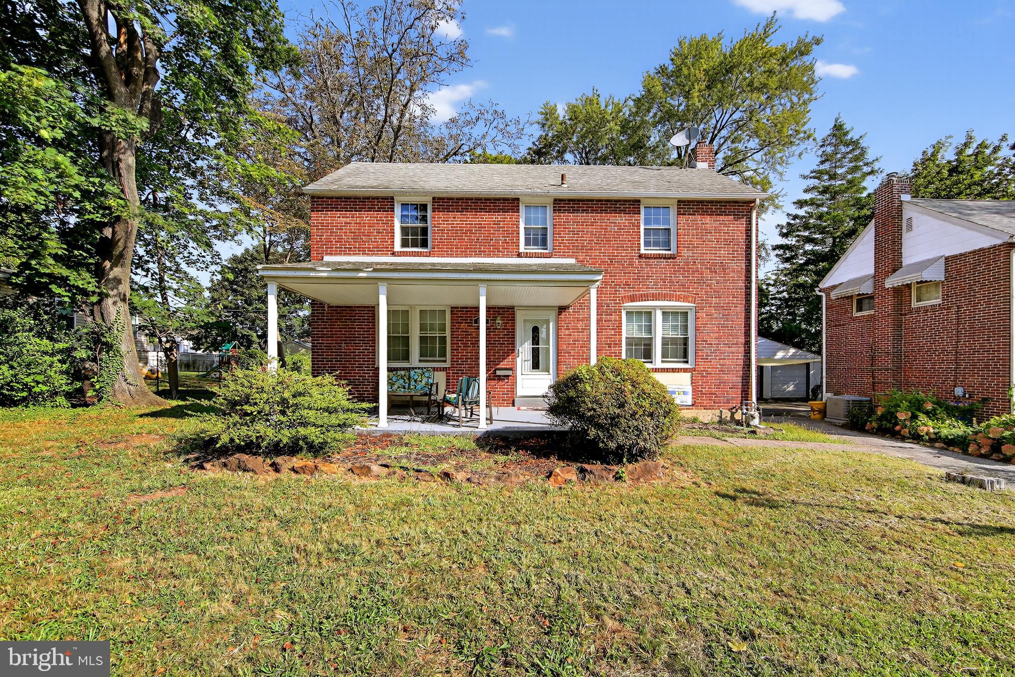 Welcome to this charming property located in the desirable Colonial Park neighborhood of Springfield Township. This well-maintained home boasts three spacious bedrooms and two bathrooms, providing ample space for families or individuals alike. As you approach, the inviting porch welcomes you into the home. The exterior showcases a sturdy brick façade, enhanced by generous landscaping making for a warm and appealing curb presence. The large yard is not only perfect for outdoor activities but also features a cozy firepit, ideal for gatherings or leisurely evenings under the stars. The driveway accommodates multiple vehicles, offering practicality along with convenience. Step inside to discover a well-designed interior. The updated kitchen serves as the heart of the home, featuring modern cabinetry, sleek countertops, and stainless steel appliances. The kitchen’s layout is both functional and aesthetic, providing a pleasant space for meal preparation and casual dining. Venture to the finished basement, a versatile area that enhances the home’s livability. This space includes a fireplace, creating a warm ambiance for relaxing or entertaining, and a wet bar for added convenience. Whether utilized as a game room, additional living space, or a home office, this finished area adds to the versatility of the property. The home’s layout is thoughtfully designed with a balance of privacy and sociability. The three bedrooms are well-sized and offer natural light, providing comfortable retreats. Located close to shopping, entertainment options, and the vibrant city of Philadelphia, this home offers not only comfort but also accessibility to urban conveniences. It is ready for its new owners and presents a wonderful opportunity in the Springfield area. This property truly combines function and style in a welcoming and warm environment.