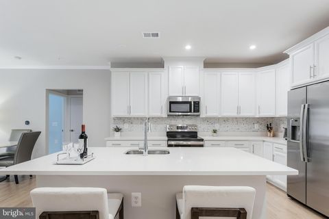 Photo of 1675 Bandit Loop #105B, RESTON, VA 20190 (MLS # VAFX2314306)