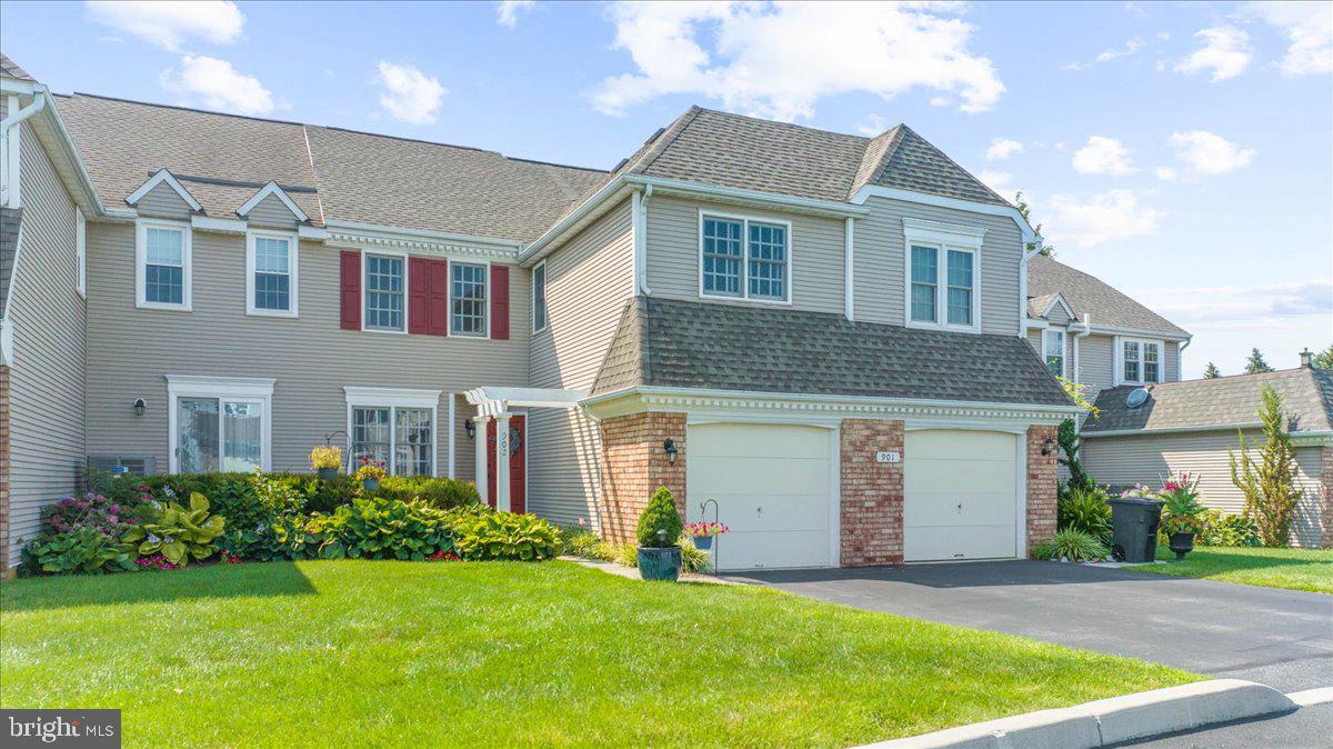 Welcome to 902 Samantha Circle, Chester Springs, PA. This wonderful 3 bed, 2.5 bath, one car garage townhome is located in the private community of Twin Hills and is ready for a new homeowner. This townhome offers 1688 sq. ft of living plus an additional 500 sq. ft (estimated) in the partially finished basement with walk out slider to the outdoors. Entering the home there is a nicely sized foyer offering beautiful refinished hardwood flooring. Off the open foyer is access to the garage, laundry room and a half bath. On the other side of the entry is a nice sized office/den with dual windows for a view out of the front of the home. Walking down the foyer through the hall is a large, open living room/dining room area, as well as a kitchen. The kitchen features updated appliances and hardwood flooring. Opening off the kitchen is wide open living room/dining room area offering a wood burning fireplace and a sliding glass door that leads to a newer enlarged Trex, low maintenance deck (2016) deck. Walking upstairs to the second floor, there is a nice hall landing that sends you into all three bedrooms and a main hall bath. The complete second floor also has hardwood floors throughout. The primary bedroom is large and offers plenty of light and space to relax and enjoy. There is a primary bathroom off the bedroom with a soaking tub and shower. There is a two-sink vanity and a cabinet for plenty of storage. Off the primary bedroom is a walk-in closet allowing for plenty of room for all your clothes. The main hall bath has a nice tub/shower, tiled floor and a one sink vanity. Additionally, there are two additional bedrooms with closets and tons of light to shine in when the shades are open. Entering the basement stairs and leading to the basement is a partially finished basement offering Italian floor tiles and carpet as well as recessed lighting, a custom designed bar made by a local Amish cabinet maker and handmade wooden counter top. The bar also offers storage and a nice wine refrigerator.  There is also an additional unfinished area in the basement allowing for additional storage. Twin Hills Community offers wonderful walking trails and plenty of open space for all the homeowners to utilize. The Twin Hills community is located near major commuting routes such as, RTE 202, the PA turnpike, RTE 100 and many train stations as well. The popular Marsh Creek State Park, is 10 minutes from 902 Samantha Circle and offers swimming, kayaking, walking trails, canoeing and more in the summer time. Great shopping and easy access to many great places for shopping options are very close by. Don't miss the chance to see this wonderful home and make it yours!