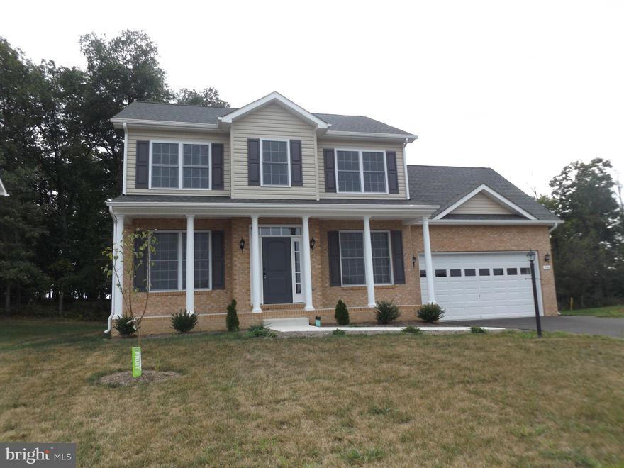 Ready to move in! This quality home was built by local builder with over 30 years experience. Located in sought out Webber Springs subdivision, this home is on a lot backed to farmland. Hardwood on the 1st floor and carpet upstairs. A must see for anyone looking for a quality built home in a great location!