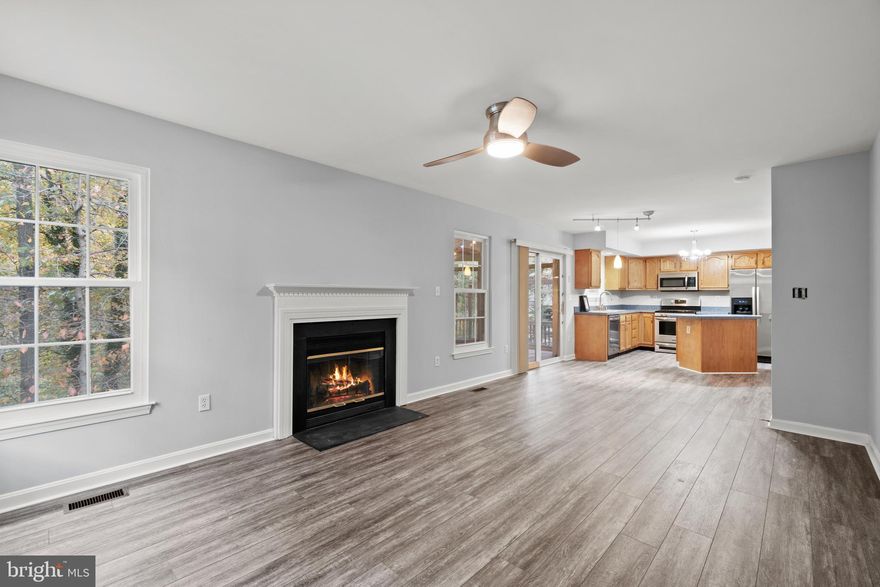 Offer received 11/29 so best and final due! Welcome to one of the prettiest streets in Linthicum, located at the very end of the cul-de-sac, facing open space, this Colonial packs 4 bedrooms, 2 full and 2 half baths, a 2 car garage and a sunroom addition on an easy care sloped treed nature yard.  Living room, dining room, updated kitchen, family room , sunroom and powder room on main level.  
Upstairs primary suite is huge with vaulted ceilings, walk-in closet, super sexy primary bathroom suite, with separate soaking tub and shower upgrade and three other generous bedrooms. 
Lower level has a cool finished rec room area with storage, half bath and a walk out with sliders to more outdoor area and decking. Public water and public sewer with natural gas heat! Windows and roof were replaced. No mandatory homeowner's association or rules, but everyone takes pride here. 
Lots of extra parking on a long driveway with simple landscaping and a wild forested yard that is private but does not need grooming, unless you choose. Gutter guards to lower maintenance and invisible fence for your dog family.
Please pay no mind to days on market, it was on the market with a tenant and dog and limited messy access. We took it off the market after tenant moved out, cleaned it up, painted, replaced all floors, lights, and you can just move in time for the Holidays! And we did not increase the price as your gift!