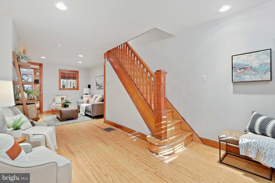 Welcome to 313 South Washington St. where you will find the reason why Charm City is often used to describe Baltimore. With hardwood floors, natural wood trim throughout, and exposed brick on every level this homes character brings cozy Fells Point serenity to everyday living. Enter through the main level into a large living room that flows straight into the kitchen. The large window between the kitchen and living room makes entertaining guests fun and easy. Towards the back of the kitchen there is a full bathroom with a standup shower and just passed the bathroom down the hall there is access to the back patio. Have coffee in the morning or wine in the evening and enjoy nature surrounded by flowerbeds and a gaze upon the softly swaying willow that sways just above the patio. There is a full unfinished basement that runs the length of the home for plenty of storage space. The ceiling height in the basement makes it easy for walking around and organizing storage. Up the stairs there is a bedroom to the right and the left joined by a full bathroom in the middle off of the second level hall. Through the left bedroom you’ll find stairs that go up to the third level. This room can be used as an office, large bedroom, or work out room. Additionally, this home is located within a five minute drive to the Safeway 24/7 grocery store, a six minute drive away from the Target/Harris Teeter shopping center, and a ten minute walk to Broadway Square Fells Point Restaurants and Bars. South Washington street is a tree lined street giving vibes of nature to city living. Lastly, there is a secured parking garage three doors down from the property. This one won’t last long!
--