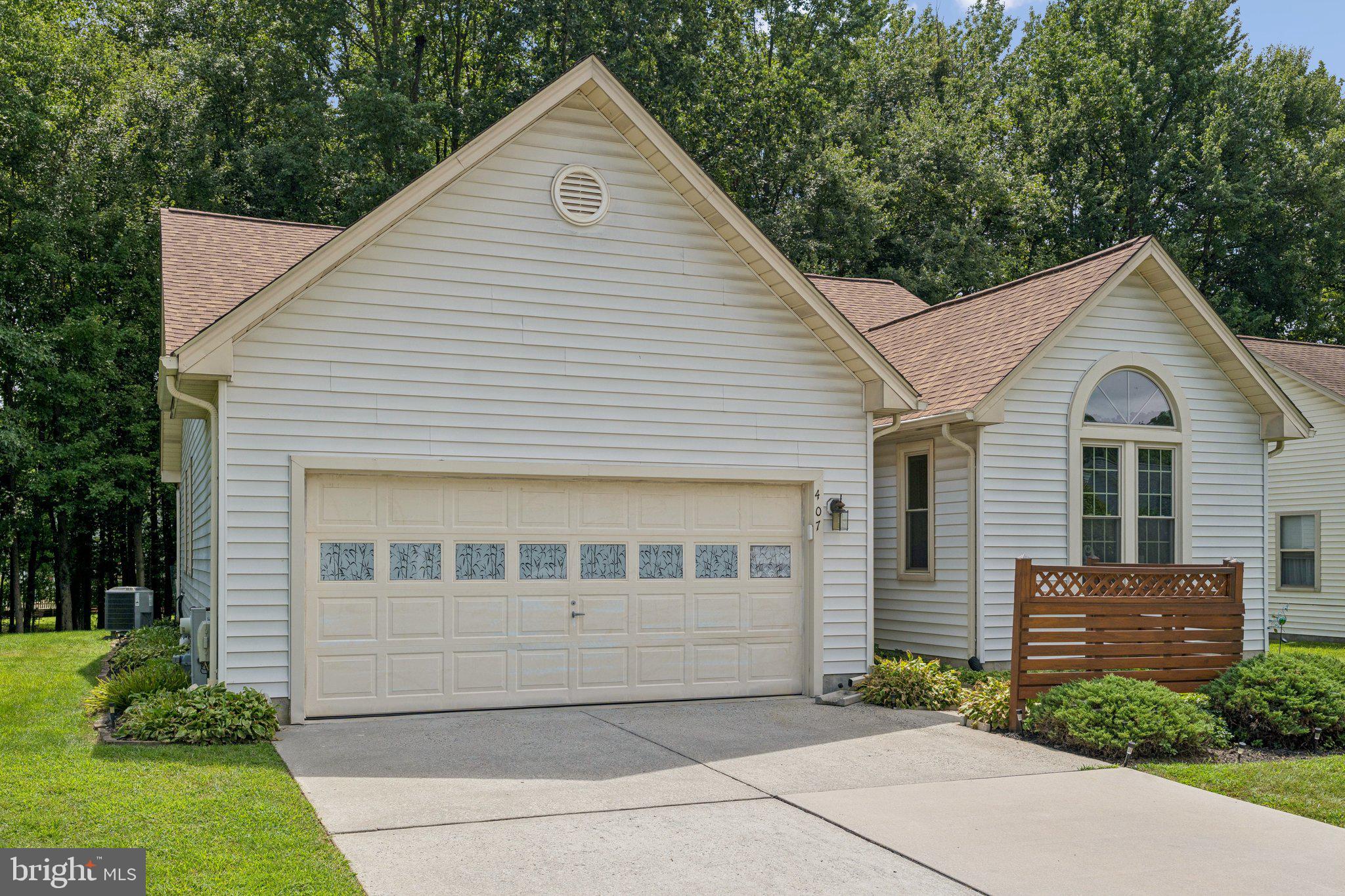 Welcome to this beautifully maintained rancher, perfectly situated on a stunning lot that backs to serene woods. This home offers both comfort and style, with thoughtful updates and inviting living spaces throughout.
The bright and airy living room boasts vaulted ceilings and flows seamlessly into the dining room, creating an open-concept feel that’s perfect for both everyday living and entertaining. The kitchen features granite countertops, stainless steel appliances, and direct access to a cozy second family room. From there, step onto the tranquil screened porch and take in the peaceful views of the wooded backyard.
The home offers three spacious bedrooms, including a generous owner’s suite with a private en suite bath. Additional highlights include a large two-car garage, Andersen windows, and a host of recent updates: HVAC (2024), roof by Long Fence (2023), water heater (2020), and all kitchen appliances replaced since 2018, with a brand-new dishwasher.
This is a move-in ready gem in a beautiful setting—don’t miss your opportunity to make it yours!
