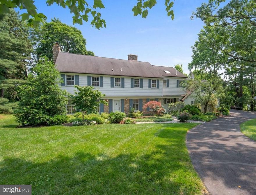 Great value in Upper Dublin Township!  If you have ever dreamed of living in a peaceful setting without losing your connection to the city or other conveniences, this may be your dream home. Welcome to 103 Flick Dr., a must-see property located on a quiet cu-de-sac, this scenic 1.6 acre parcel has beautiful mature trees backing up to woods giving this spacious home privacy.   Complete with 5 bedrooms, 4 full and 2 half bath with a huge great room.  Plus a private guest studio with kitchen and full bath over the separate garages.  The first floor features a lovely eat in kitchen with seating off of an island, and built-in display cabinets, Wide width pegged plank floors, Dining room with built in cabinets, gas fire place in the Sitting Room off of the kitchen, a large Living Room with wood burning fireplace, plantain shutters, two powder rooms, enormous great room with cathedral ceilings, bar, and pool table perfect for entertaining.  Outside on the main level is a large deck and screened-in porch area.  On the second floor, there is a full bath at the top of the steps, an office overlooking the great room and there are four bedrooms, one of those bedrooms has its own on-suite full bath and double closets, perfect for guest bedroom.  The master bedroom is included on the second floor, complete with two spacious walk in closets, on suite bathroom with double sinks, two piece water closet and shower.  Laundry is next to the master bedroom.  Off of the master bedroom is additional space over the garage featuring skylights- a good space for exercising, and staircase leading back to the first floor.   The walk-out lower level includes the fifth bedroom, full bathroom, fireplace, kitchen, pantry storage, perfect for au-pair, home office, in-law suite.  Separate on the lower level is an indoor full-size Lap Pool and Hot Tub, which is perfect for use all year.  There are 2 parking spaces in the attached garage and 4 more spaces in the separated garage.  This home is in a great location: minutes from the turnpike entrance, close to Manufacturers CC, in Upper Dublin aware winning School District, shopping, and trains.  Bring all offers!