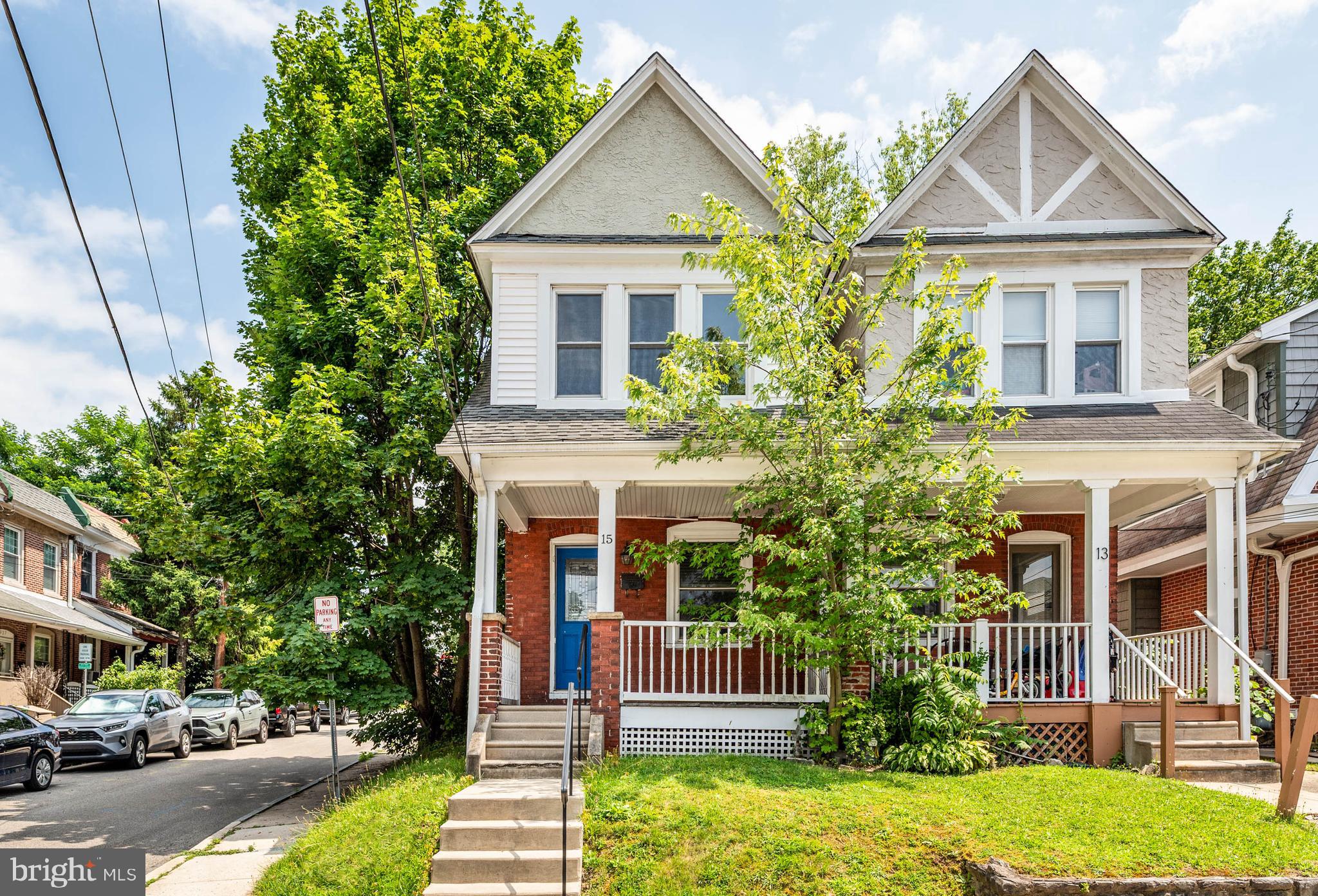 Welcome to 15 North Warner Ave, a charming 5 bedroom, 2 bathroom twin in the heart of Bryn Mawr! An excellent value, 15 North Warner offers timeless colonial curb appeal, gleaming hardwood floors, a quaint front porch, and a private stone driveway with room for two cars. Don’t forget: the home’s location within Lower Merion township affords you access to highly-sought after Lower Merion School District as well as excellent parks and libraries.
As you approach the home, you’ll appreciate the two-car driveway which is a true rarity in this bustling neighborhood. The front porch is the perfect welcome to this home, reflecting the inviting nature and charming style of the home. In the foyer you’ll enjoy the regal grand staircase and the sun-drenched atmosphere which carries throughout the home. Thanks to the large bay window in the living room, the main level enjoys a cheerful and bright energy. Head through to the dining room where you’ll enjoy everything from casual breakfasts to formal dinners during the holidays. The kitchen is quaint, comfortable, and spacious enough for expansion as the new buyers see fit. A full bathroom with laundry completes the main level, an excellent, convenient layout for day to day living. Head upstairs to the second level where you’ll find 3 spacious bedrooms and a hallway full bathroom. Two additional bedrooms can be found on the third floor. With five bedrooms total, there is plenty of room for guests, an office, hobby room, or a home gym. Don’t forget, the unfinished lower level can accommodate any storage needs, or, finish it and enjoy additional living space!
15 N Warner is a phenomenal opportunity to own a home in this coveted Main Line location, just a short walk to the bustling shopping, restaurants, bars, and entertainment options in Bryn Mawr and Rosemont! There is so much to love about this home, come by and see for yourself.