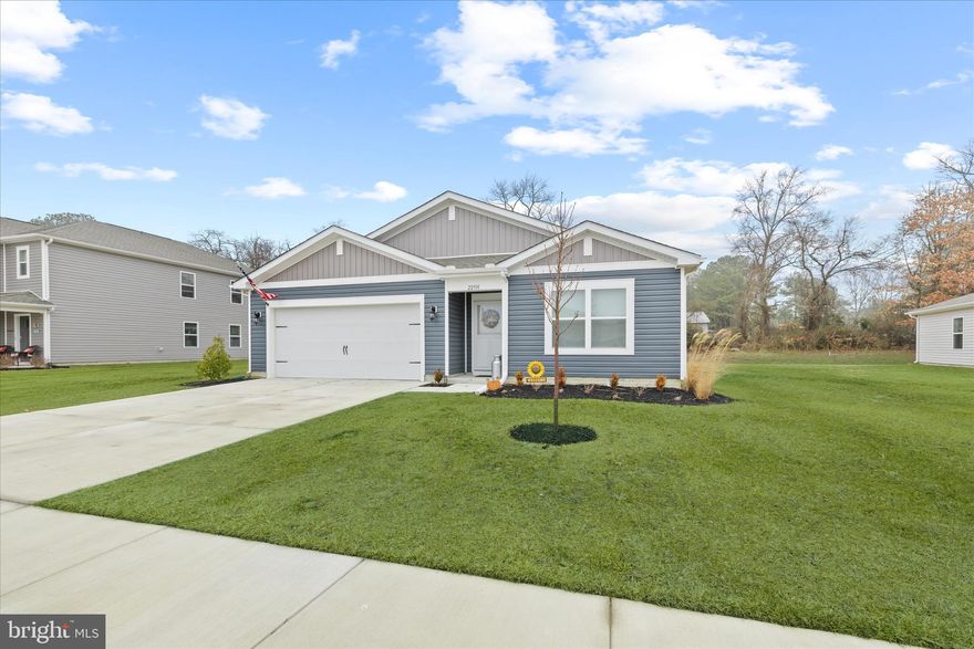 NEW PRICE!!! If you walked through the decorated Cali model in Plover Point only to learn there were NO MORE being built, this is your opportunity! There are only a handful of homesites remaining by D.R. Horton, and none will be Cali's, making this your only chance to own the layout so many buyers have admired. This 2025 home mirrors the model’s beloved one-level-living design, and includes the covered back porch, as well as some resident added extras: cabinetry in the laundry room, an attractive tiled backsplash in the kitchen, and convenient shower doors in the owner's bathroom, and a garage door opener, all of which are not offered by the builder. 

With four nicely sized bedrooms and two full baths, the layout provides space to spread out while still feeling connected. The owner’s suite is tucked away for privacy and feels like a true retreat. The owner's bathroom is what sets the Cali apart, with double sinks, a walk-in shower, private water closet, an enormous linen closet, and a walk-in closet that easily accommodates all your clothing. The other three bedrooms are on the opposite side of the home and share a full bathroom with a tub/shower unit. 

The open concept living space features vinyl plank flooring and includes a kitchen with beautiful bright white cabinetry and stainless steel appliances, all centered around a large island with an overhang for barstools (included!) — perfect for morning coffee, homework, conversation, or easy meals. Granite countertops, a single-bowl stainless steel undermount sink with disposal, a pull-out Moen faucet, and a walk-in pantry make the space as practical as it is welcoming.

Quality built with 2x6 construction for energy efficiency and comfort, this home offers thoughtful quality throughout. And with less than a year of occupancy, it still feels nearly new — with the 1-year, 2-year, and 10-year structural warranties in place for added peace of mind.

The community playground and pool offer relaxing outdoor spaces to spend warm summer days, and residents have been using the large community park for picnics and get togethers. Plover Point is just down the street from Indian River Bay, and that means boating, paddleboarding, and sunset views!  Wide open common areas and a minimum of 36 feet between homes, gives a feeling of openness not found in other new-home communities.  It’s a setting that invites you to enjoy coastal Delaware the way it’s meant to be experienced.

Single-level living, generous space, close proximity to the water and every convenience you could need (groceries, gas, shopping, dining, medical) — all in a home that feels fresh, comfortable, and ready for its next chapter.