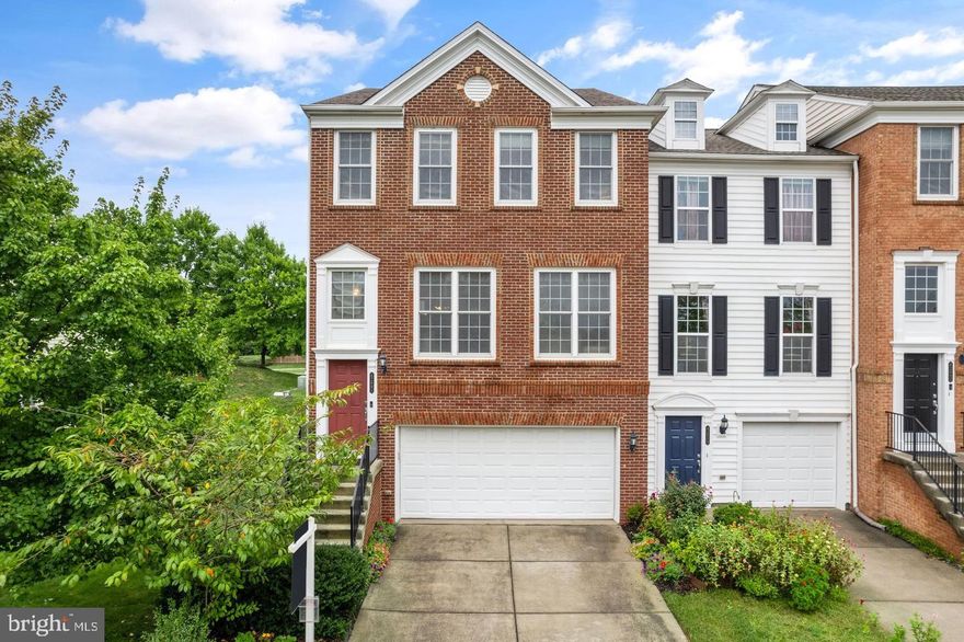 Welcome to this stunning end-unit brick townhome in the sought-after Windermere neighborhood of Ashburn, feeding into the Briar Woods HS pyramid! With 2,984 sq. ft., this home offers 4 bedrooms, 3.5 bathrooms, a deck, and a patio, providing ample space for everyone.
The bright and spacious main level features a large living room, a kitchen with granite countertops and pantry, and a formal dining area. A 3-level bump-out adds extra space for an office, rec room, or dream pantry. Step onto the Trex deck and enjoy the privacy of a tree-lined lot.
Upstairs boasts 3 spacious bedrooms, including a luxurious primary suite with a tray ceiling, walk-in closet, and spa-like bathroom with a soaking tub, double vanity, and stand-up shower. Convenient upstairs laundry included.
The basement offers a large rec space, walk-out patio, legal 4th bedroom, and full bath. 
UPGRADES: New water heater (2023), Trex deck (2022), A/C (2022), full roof replacement (2019), and more! Prime location near Ashburn Metro, Brambleton Town Center, One Loudoun, and commuter routes. Don't miss it!