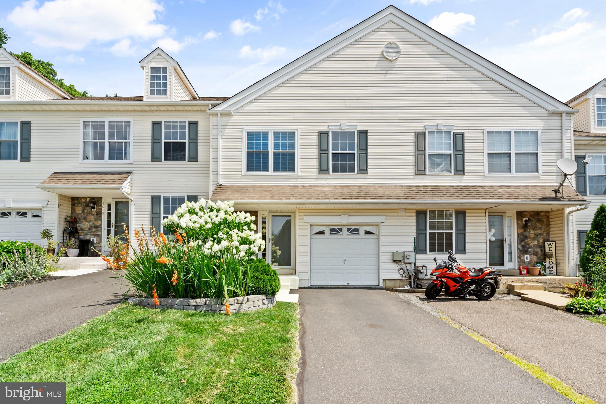 Welcome home to 4650 Louise Saint Claire Drive, this 3-bedroom 2.1 bathroom townhome has one of the most beautiful backyard settings in all of Patriot's Ridge! Come fall in love with the updated kitchen with granite counters, white cabinets, stainless steel appliances, and gas range. The open living and dining room, both with hardwood floors, have abundant natural light pouring through sliding glass doors that lead to the private patio for dining al fresco. Upstairs, you’ll admire new carpet and neutral paint throughout. The generous primary bedroom enjoys views of the wooded backyard with both a walk-in closet and a tastefully updated en suite bathroom with stall shower. Two additional bedrooms share a hallway bathroom with convenient laundry access. The partially finished basement is perfect for movie nights, a home gym, office, storage, or whatever suits your needs. One-car garage, affordable utilities, and close proximity to all Doylestown Borough has to offer. Assigned to Central Bucks schools. This one won't last!