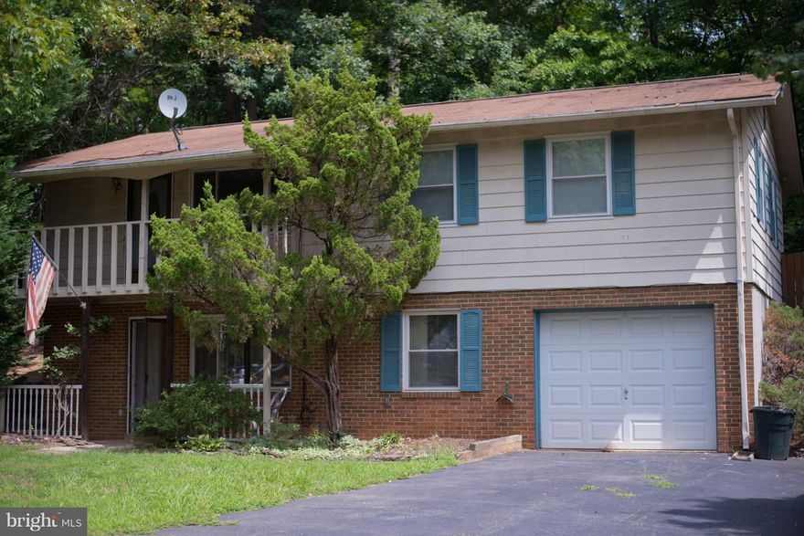 This spacious 2 level home is ready for a new tenant. Two rooms on the main level that can be used as bedrooms or den and playroom with lots of storage space. 3 bedrooms upstairs with 2 baths.  Large utility room with extra storage.