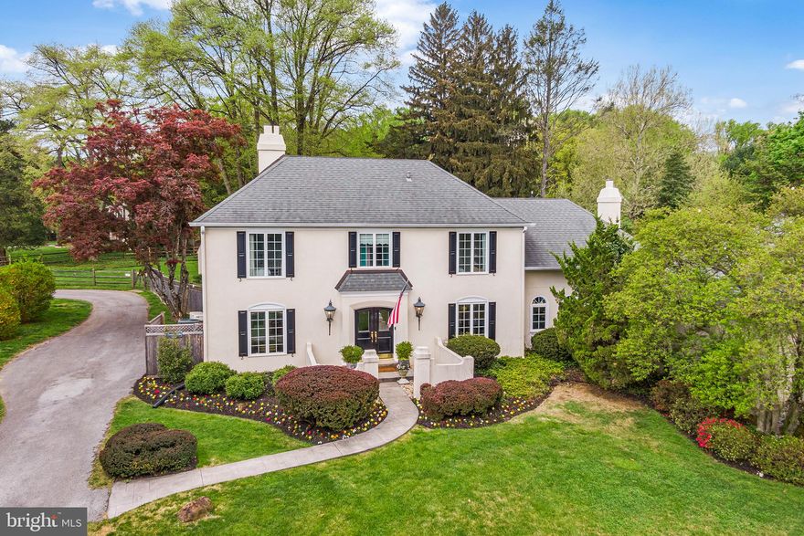 Welcome to 410 N. Valley Forge Road, the perfect property for today’s work-at-home lifestyle. This special mini-estate is comprised of a Main Home and a separate detached carriage house offering a combined living space of over 5000sf plus an in-ground pool, outdoor fire pit, fenced yard and more!  Completely renovated by Rudloff Builders in 2016/2017 – The renovations are stunning in every detail and the lot sits on a flat 1.1-acre with beautiful, manicured grounds off a private lane in Easttown Twp. The Main Home features 4 nicely sized bedrooms, 3 full baths, 2 gas fireplaces, and a first-floor office. The primary bedroom features an expansive walk-in closet area and newer bathroom with double vanities and steam shower.  The bright and luxurious chef’s kitchen has been reconfigured and renovated with marble countertops, a Kohler farmhouse sink, a 8 burner gas stove & double oven, and offers island seating, bar and a breakfast room area. Adjacent to the kitchen is the sun-drenched family room with its beamed ceilings, built-in shelving and French doors to the backyard oasis all ready to enjoy al fresco dining, swimming in the heated pool and snuggling by the stone fire pit surrounded by Adirondack chairs.  Beyond the fire pit, you will find the renovated Guest House complete with a full bath, kitchen, and living area with a separate driveway and rear yard entrance. A perfect space for a home office, au pair or in-law suite, or simply a guest house. The lower level is finished with an egress window, exercise room and lower level laundry.  Located less than .5 mile from the Devon train station and in the top-rated T/E school district with numerous private schools nearby as well as minutes to downtown Wayne, Devon Yards each offers an abundance of shops and restaurants to explore.  Extras include a full house back-up gas generator, mud room, attached two car garage, LOW taxes, newer Jeld Wen windows with a transferable warranty and so much more.
