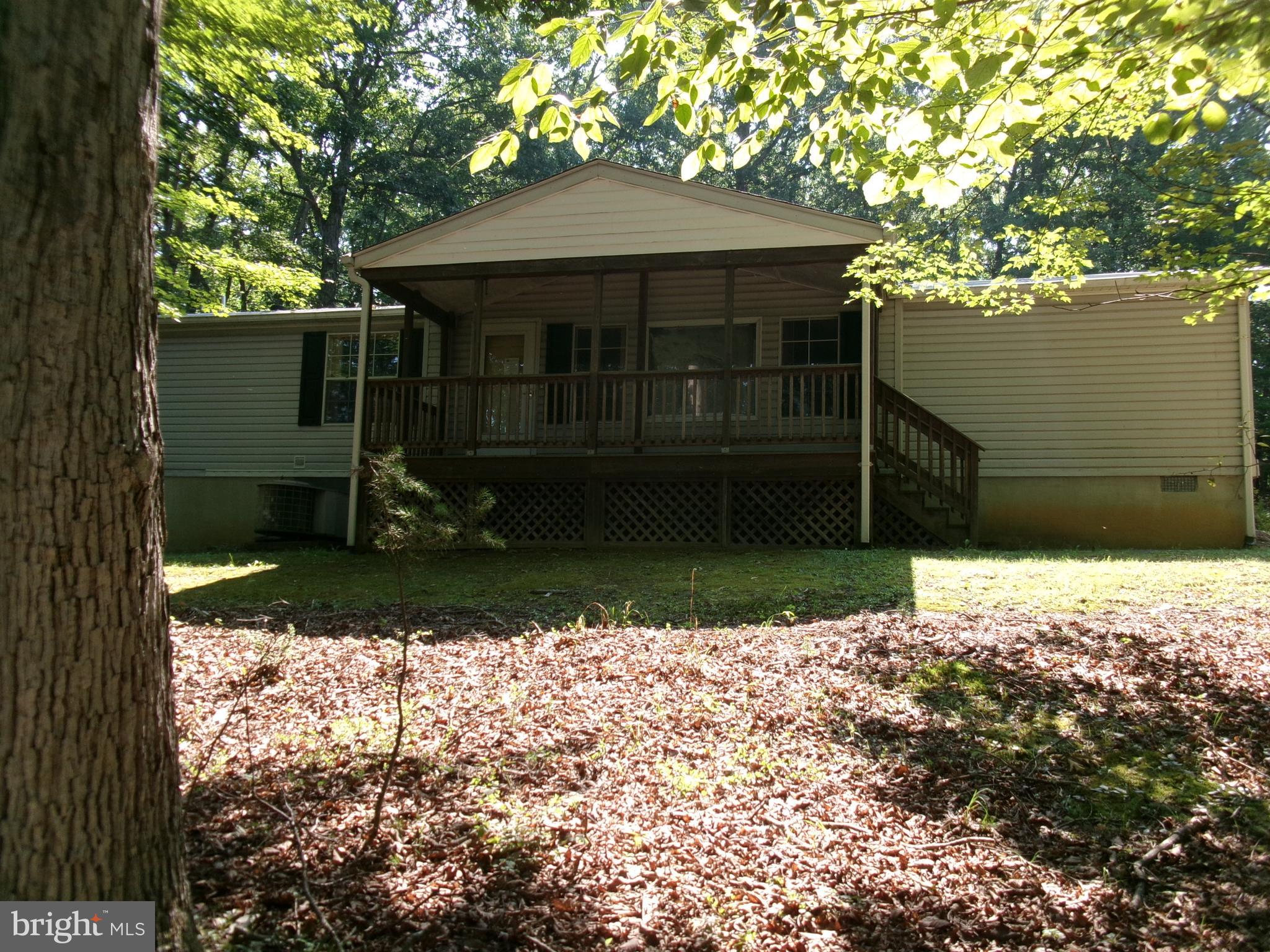 125 WHISPERING KNOLLS DRIVE