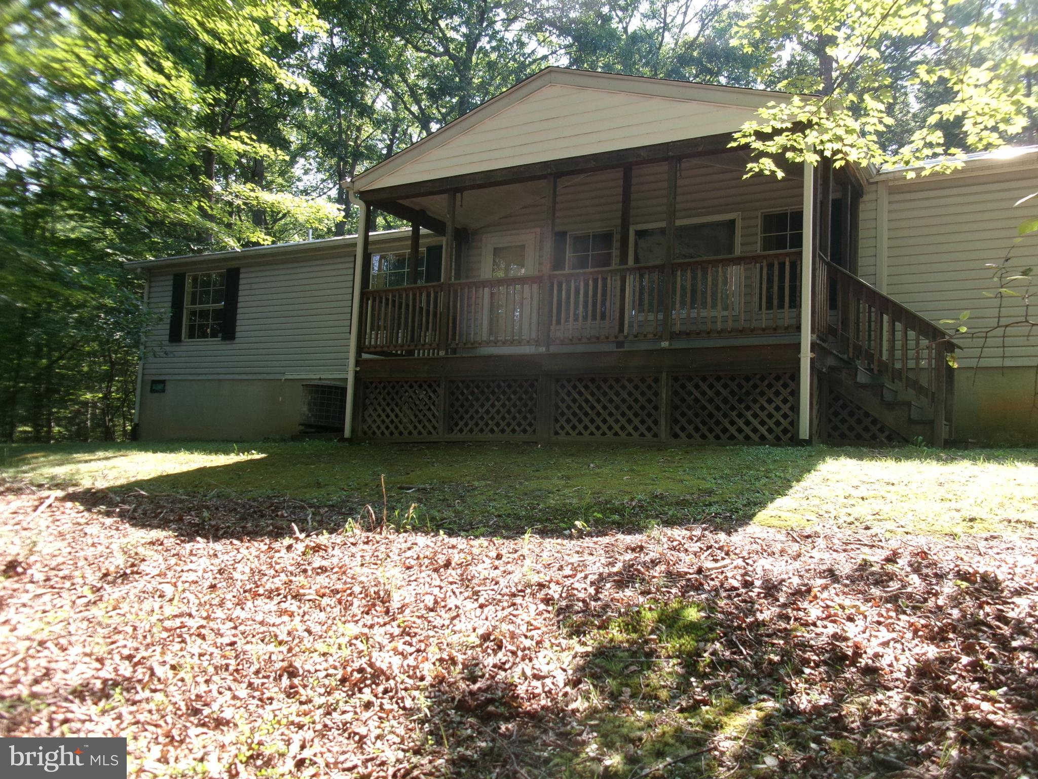 125 WHISPERING KNOLLS DRIVE