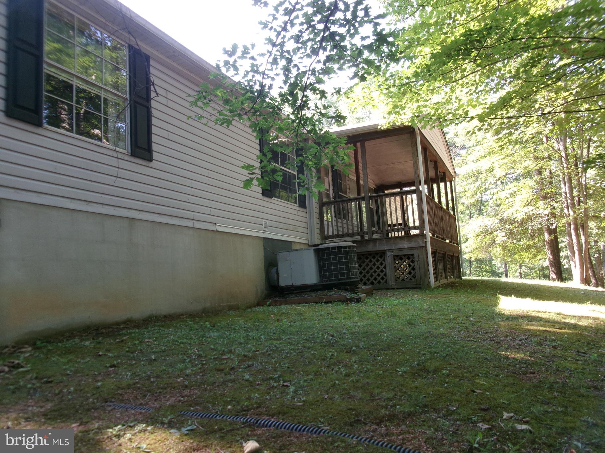 125 WHISPERING KNOLLS DRIVE
