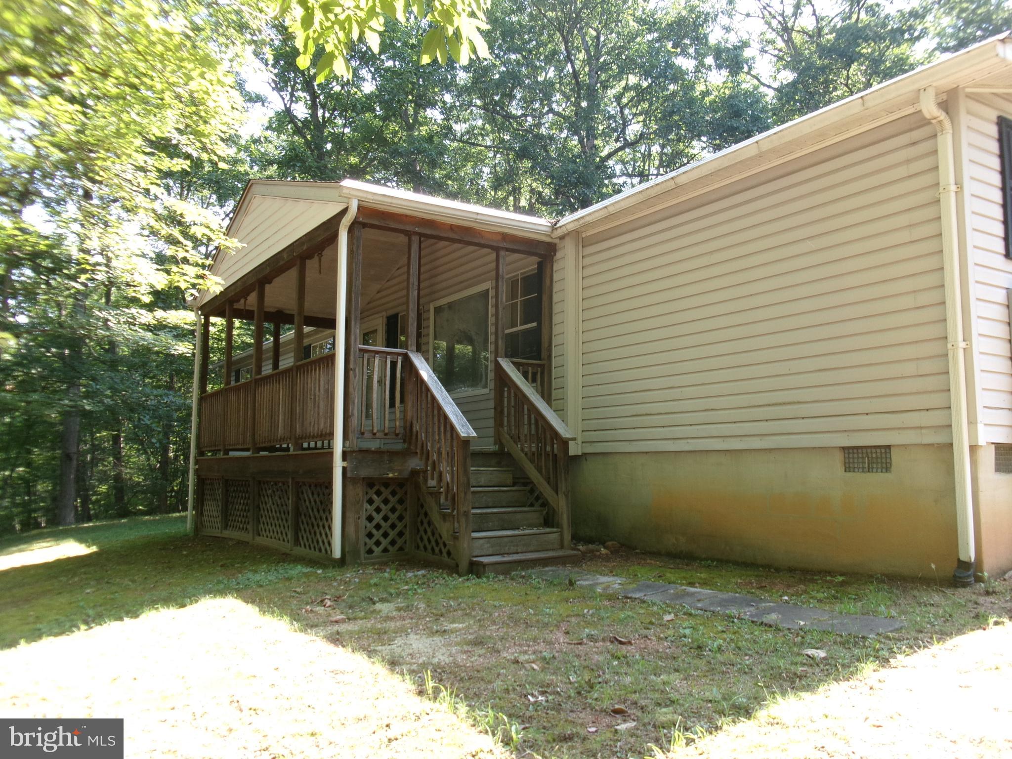 125 WHISPERING KNOLLS DRIVE