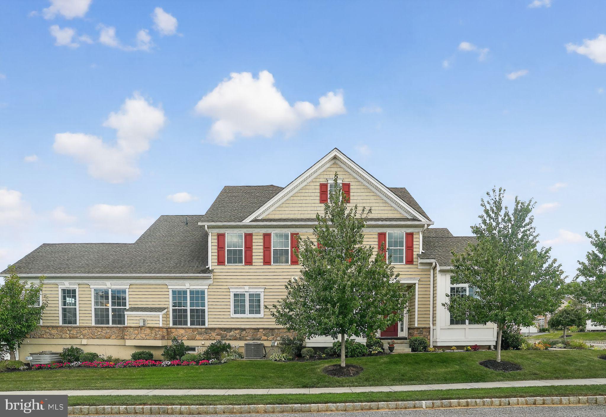 DESIRABLE END UNIT RADIATING TIMELESS ELEGANCE & LUXURY LIVING
Welcome to a residence that redefines upscale living. An exceptional end unit perfectly positioned on a premium corner lot in the highly sought-after 55+ community of White Springs at Providence. This rare end unit offers abundant natural light, thoughtful design, upscale details and effortless charm.
From the moment you arrive, the home impresses with its lively floral landscape leading you to your private front entrance.
The home opens to a dramatic two-story foyer with a sweeping staircase. Just off the entry, a stunning front room with French doors, soaring cathedral ceilings, and an abundance of natural light offers exceptional versatility. Currently serving as a home office, this sophisticated space would be equally ideal as a cozy den, reading retreat, or creative studio.
At the heart of the home is a gourmet kitchen designed for both chefs and entertainers. Anchored by a striking 9-foot island with cabinetry on both sides, this culinary space also boasts a spacious pantry, a professional-grade six-burner cooktop, and sleek wall ovens— seamlessly blending style and function.
Situated off the kitchen, the expansive great room impresses with soaring cathedral ceilings and a sophisticated gas fireplace, creating a warm and inviting atmosphere. Just beyond, a light-filled sunroom offers a rare and coveted feature not commonly found in homes throughout the community. Designed for year-round enjoyment, it’s the perfect place to unwind—whether you're admiring a peaceful snowfall in winter or basking in the golden light of summer.
Step outside to your oversized trex deck—an ideal space for both relaxation and entertaining. Enjoy effortless grilling with the built-in gas line (no more hauling propane tanks), or savor a quiet morning coffee as butterflies dance around the nearby butterfly bush.
The first-floor primary suite is a serene sanctuary bathed in natural light, featuring a dedicated vanity area, an expansive walk-in closet, and a spa-inspired en-suite bath complete with dual vanities for refined everyday comfort.
The laundry room, also conveniently located on the first floor, provides direct access to the meticulously maintained two-car garage, featuring gleaming epoxy floors that offer enhanced durability, resistance to wear, and effortless maintenance.
Upstairs features two spacious bedrooms, each thoughtfully outfitted with ample closet storage, complemented by a well-appointed full bathroom. A charming loft overlooking the great room provides a versatile space ideal for relaxation, work, or leisure.
Sunlight fills every room, thanks to the premium corner-lot placement.
As part of White Springs at Providence, residents enjoy top-tier amenities including a clubhouse with party and card rooms, a fitness center, resort-style pool, pavilion, pool table, tennis and bocce courts—all just steps from your door.
Ideally situated just one mile from Providence Town Center—home to Wegmans, boutique shopping, and a variety of dining options—this residence is also a short drive to the vibrant Downtown Phoenixville and just 17 minutes from the premier shopping and dining destination of King of Prussia.
This is more than a home—it’s a lifestyle.