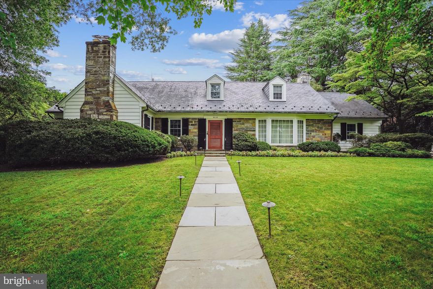 An Exceptional Spring Hill /Westmoreland Hills Residence
Set on one of the prettiest private no-thru streets in Bethesda’s coveted Spring Hill neighborhood, this enchanting home combines timeless design, solid craftsmanship, and a thoughtful floor plan designed for both everyday living and entertaining. With its charming curb appeal, lush landscaping, and inviting pool terrace, it offers both comfort and opportunity.

Step inside to a welcoming foyer that introduces the home’s beautifully proportioned spaces. The formal living room, framed by a large picture window, provides an elegant setting for gatherings, while the adjoining dining room seamlessly opens to the backyard for indoor-outdoor dining. The family room—anchored by a handsome stone wood-burning fireplace, built-ins, and a wet bar—opens directly to the back patio and yard.

At the center, the skylit kitchen with breakfast nook provides all the essentials, plus an adjacent laundry room for convenience. A distinguished library with a striking stone fireplace and side built-ins offers a serene retreat, perfect for quiet reading or working from home.

The main-level primary suite is a rare find, featuring dual bathrooms (one with a steam shower), a private dressing area, and two walk-in closets.

Upstairs, four generously sized bedrooms and two full bathrooms with double vanities provide comfort and flexibility for family and guests. Hallways lined with closets and charming window seats offer both function and character, while two large walk-in attics add outstanding storage.

The lower level extends the living space with a private office, full bathroom, and access to the oversized two-car garage.

Outdoors, the beautifully landscaped backyard is a private oasis with a sparkling pool (with new heater and a cover), a flagstone patio with retractable electric awning, outdoor lighting, speakers, and ample space for entertaining or quiet relaxation.

Special features include refinished hardwood floors throughout, new windows, 3-zone HVAC, a whole-house generator, built-in alarm system, sprinkler system, slate roof and copper gutters, and generous storage—demonstrating consistent care while providing a wonderful canvas for personalization and modern updates.

Spring Hill is one of Bethesda’s most sought-after enclaves, known for its peaceful setting, leafy streets, and close-knit community. Ideally located near the Potomac River, residents enjoy proximity to scenic trails, including the Capital Crescent Trail connecting to downtown Bethesda and Georgetown. Just minutes away are shopping and dining destinations such as Spring Valley, the exciting new Westbard Square development, and Whole Foods. Families will also appreciate access to top-rated public and private schools.