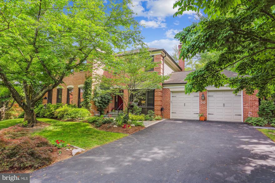 No detail has been spared in this sun-filled home featuring six bedrooms, five-and-a-half bathrooms, a two-car garage, and over five thousand square feet of living space on three levels. This home offers an abundance of privacy and a meticulously maintained outdoor space perfect for entertaining.
As you enter you’ll be wowed by the open foyer and hardwood floors throughout. To the right, you’ll find a private bedroom with an en-suite full bath that can also be used as a private home office. Make your way to the spacious living room filled with oversized windows, bringing tons of light to the space. Adjacent to the living room is the formal dining room with a large bay window. Completely renovated, the gourmet kitchen wows with quartz countertops, stainless steel appliances, a double oven, under and above cabinet lighting, a gorgeous waterfall island, and plenty of discreet and creative storage spaces, making it one-of-a-kind!
Enjoy views of the perfect entertainer’s deck and stunning backyard from both the bright breakfast area and the family room. The inviting family room features a wood-burning fireplace, built-ins, and a custom bar. The main level also features a powder room, and a mudroom leading to the two-car oversized garage complete with built-in storage discreetly hidden behind beautiful sliding barn doors.
Make your way to the upper level where you’ll find the grand owner's suite with two walk-in closets, a private sitting room or office, and an en-suite spa-like bath. With an abundance of luxurious features including gorgeous cloud tile, a soaking tub, a rain shower, and the first of two convenient laundry spaces, this bathroom can’t be beat! The upper level includes an additional spacious en-suite bedroom with stunning bathroom, as well as two more bedrooms and a beautifully renovated hall bathroom.
The sun-filled walkout lower level makes for the perfect in-law suite!  This level features a terrific family room, a second fully equipped kitchen, an amazing walk-in pantry, an additional light-filled bedroom and a newly renovated full bathroom.  You'll also find a second laundry room, and multiple large storage spaces. The lower level opens to the patio and serene backyard. Filled with a variety of gardens, stone walkways, and lush trees, this peaceful, professionally designed backyard is your private oasis! Ideally located in the Walt Whitman School district and easily accessible to I-495 - this home is the perfect 10!