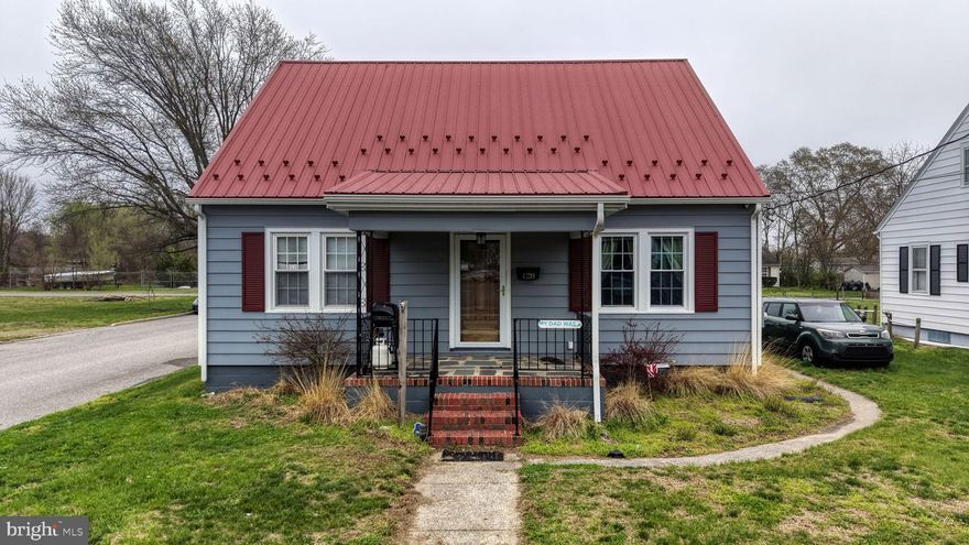 This charming Cape Cod in the heart of Laurel offers a perfect blend of cozy living and incredible utility. Featuring three bedrooms and one bathroom, this home is move-in ready with significant structural updates, including brand-new siding and a durable new metal roof.    The home has 2 zones one for the 1st floor and one for the 2nd floor.  On the second floor a 2nd bathroom was started and just need a few finishing touches to be functional.  The inside layout is complemented by a full unfinished basement, providing a blank canvas for additional living space, a home gym, or extensive storage.  The home is a A Hobbyist’s Dream as the standout feature of this property is the exceptional garage space, offering room for up to four vehicles between the 2 detached garages a 1-Car Garage and a 3-Car Garage.  The massive 3 Car Garage provides a versatile outbuilding equipped with electric, a wall AC unit, and a wood stove.  Whether you need a year-round professional workshop, a climate-controlled sanctuary for a car collection, or secure storage for boats and outdoor gear, this setup is a rare find in town limits.
